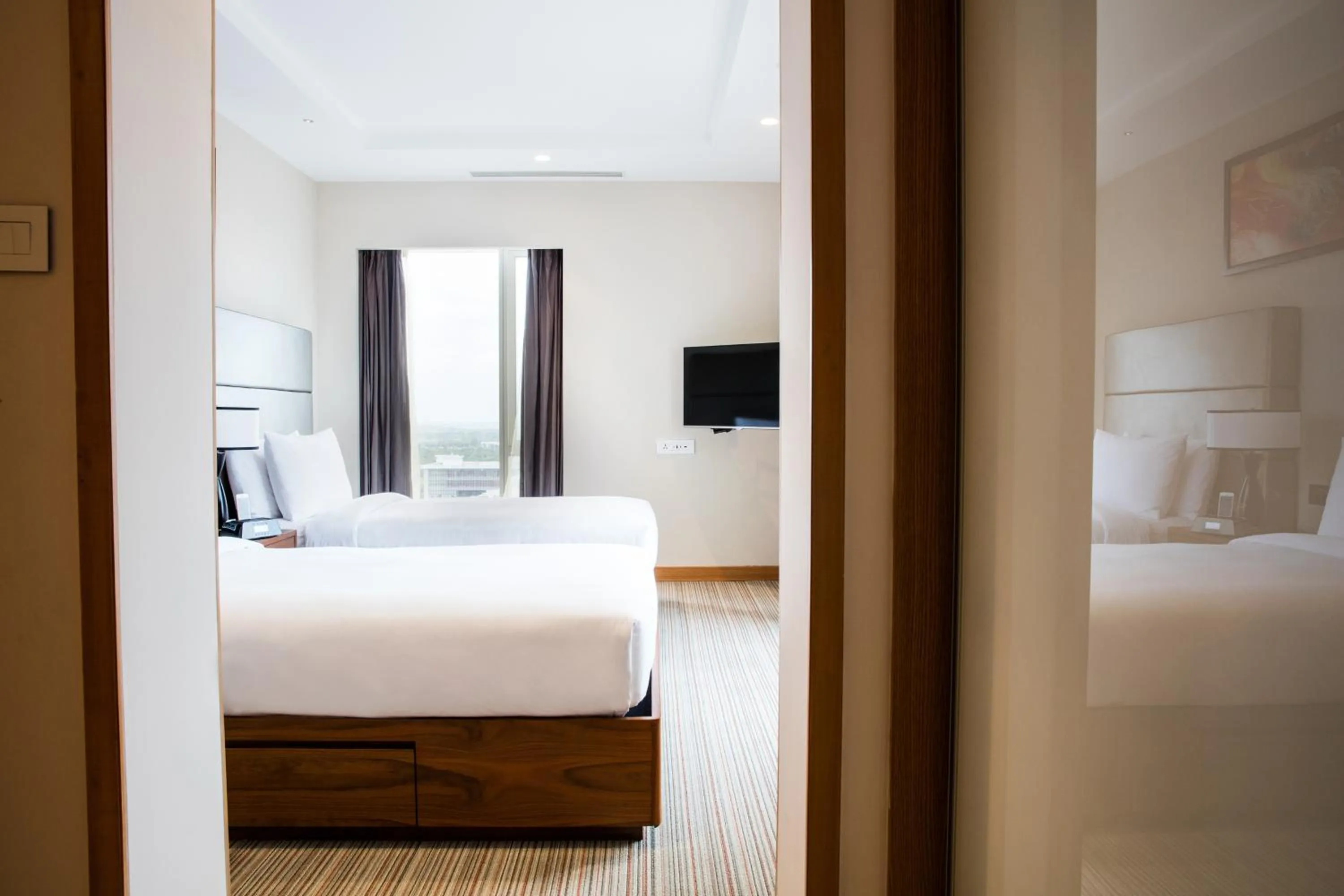 Bed in Oakwood Residence Kapil Hyderabad