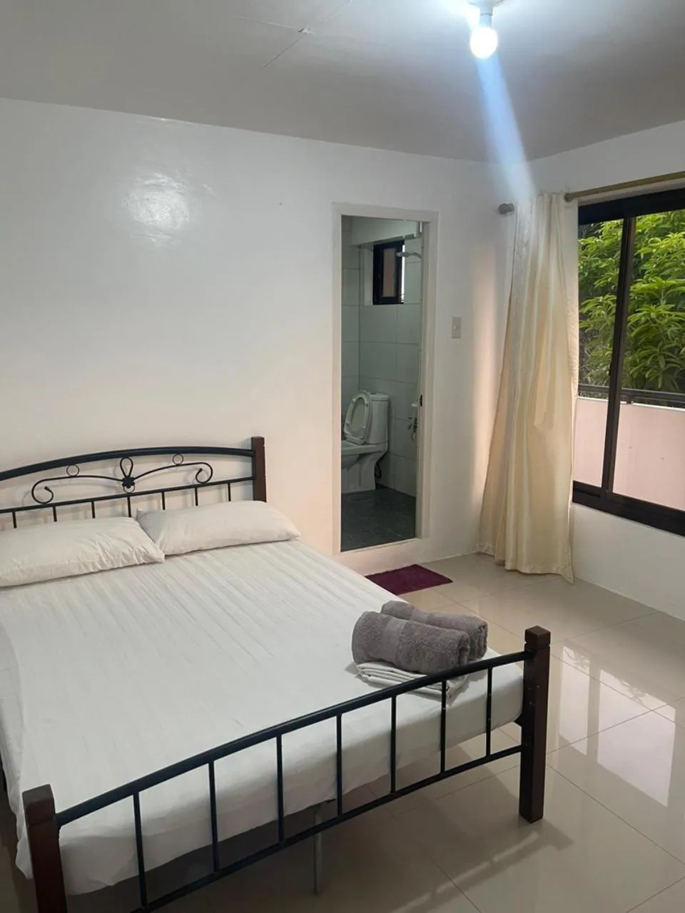 Bed in The Palines Apartment Hotel