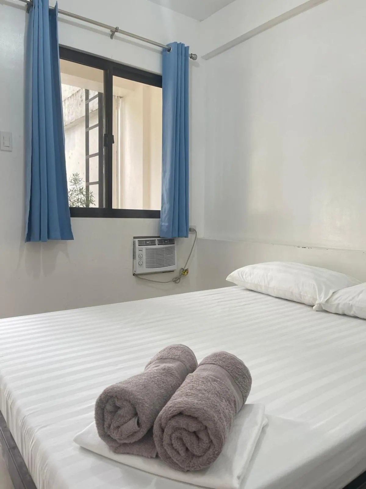 Bed in The Palines Apartment Hotel