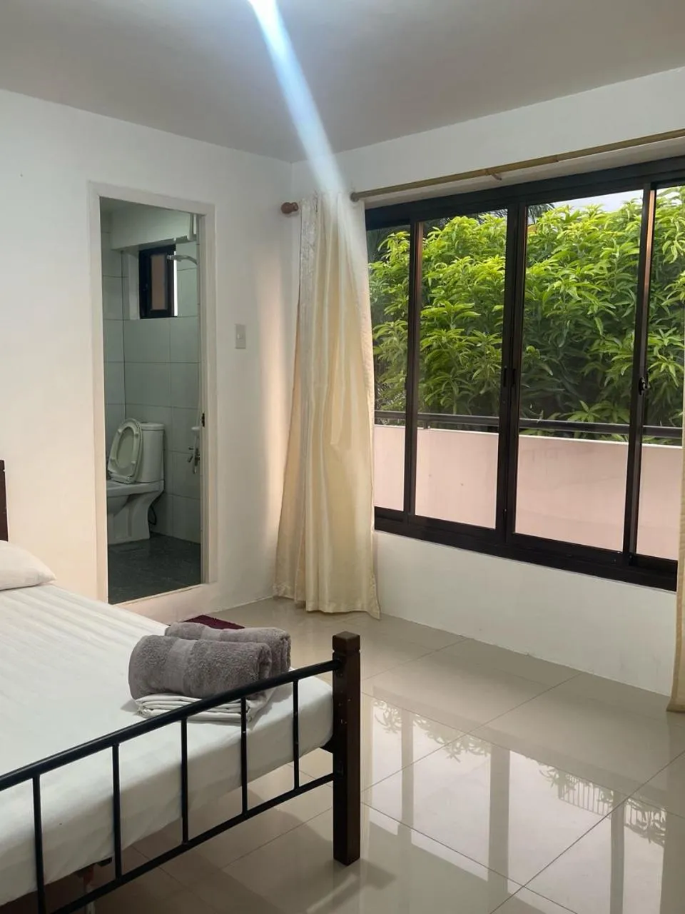 Bed in The Palines Apartment Hotel