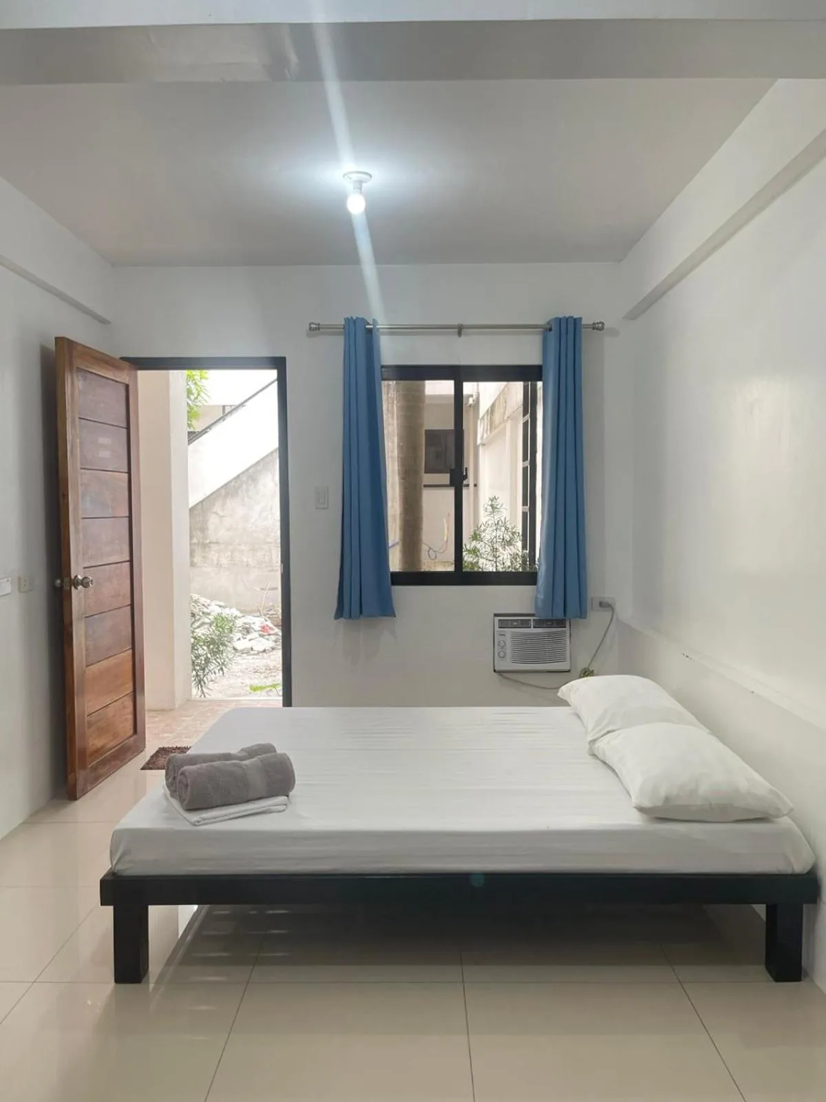 Bed in The Palines Apartment Hotel