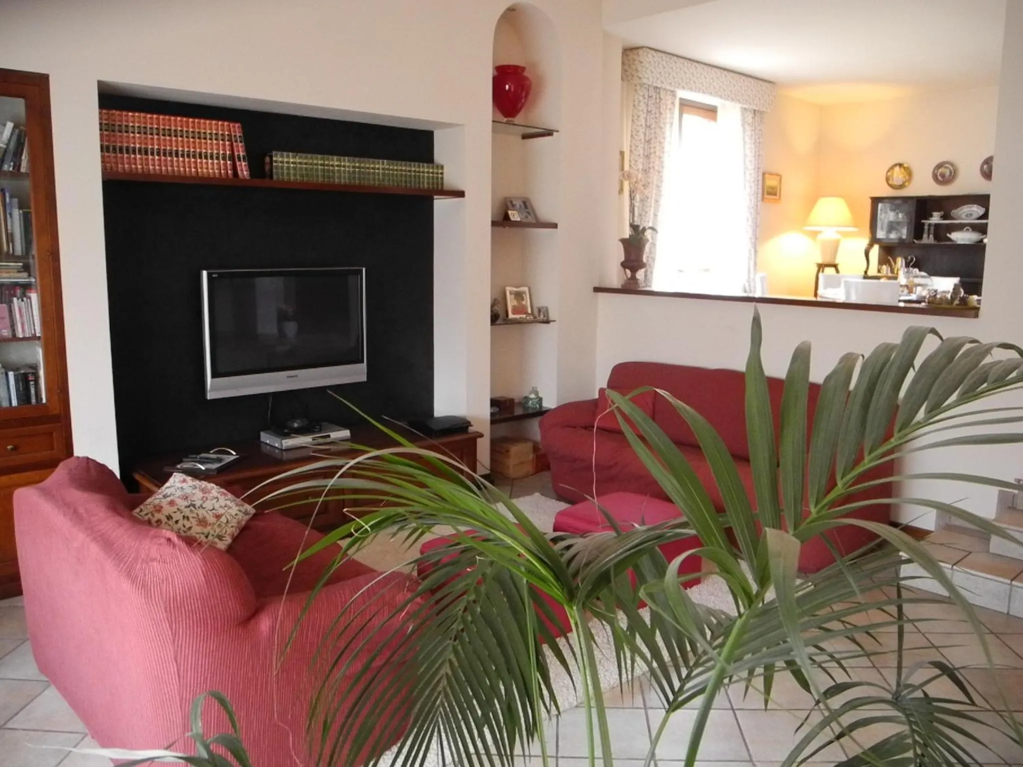 Communal lounge/ TV room in Villa Campo dei Fiori