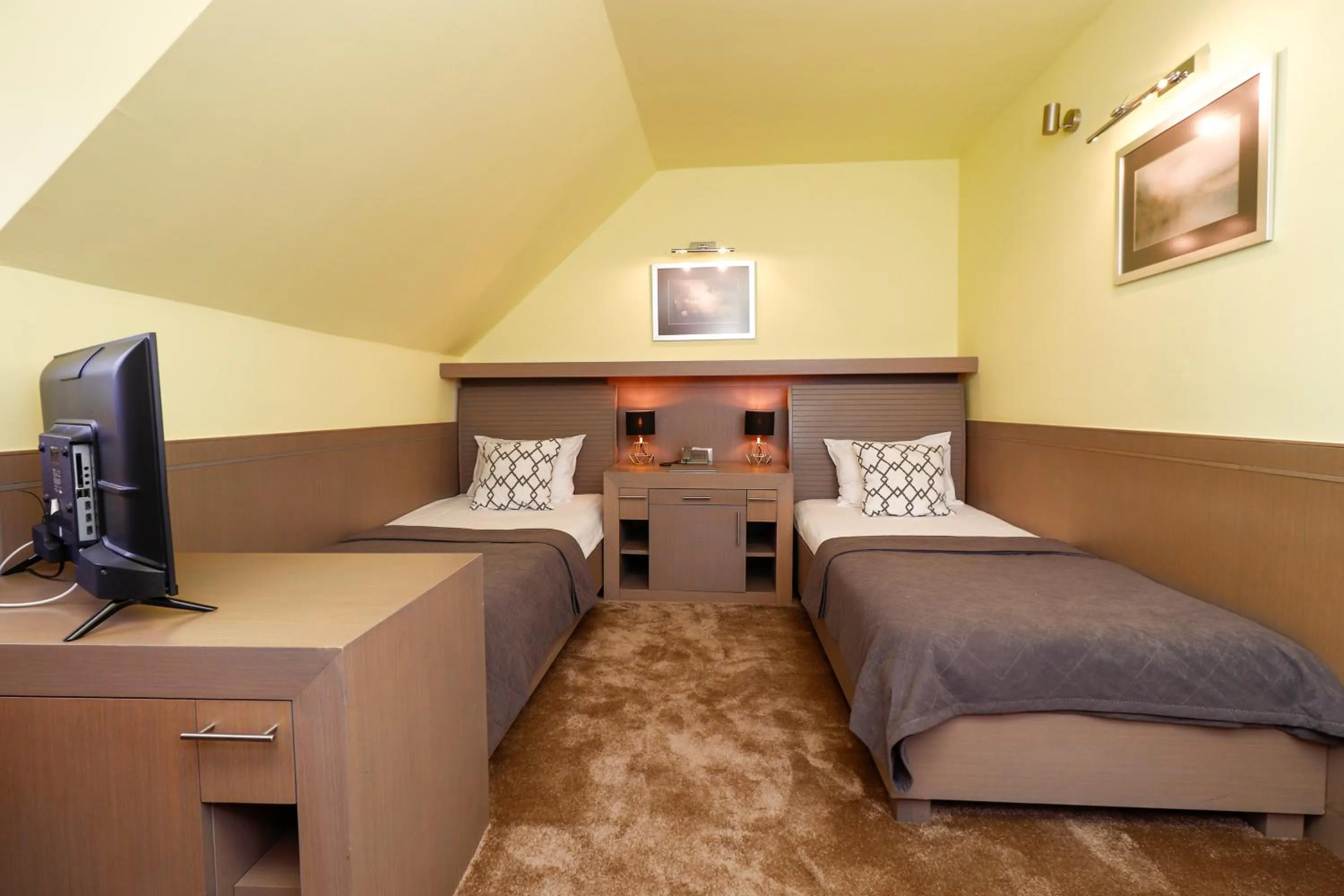 Bed in Garni Hotel Leopold I