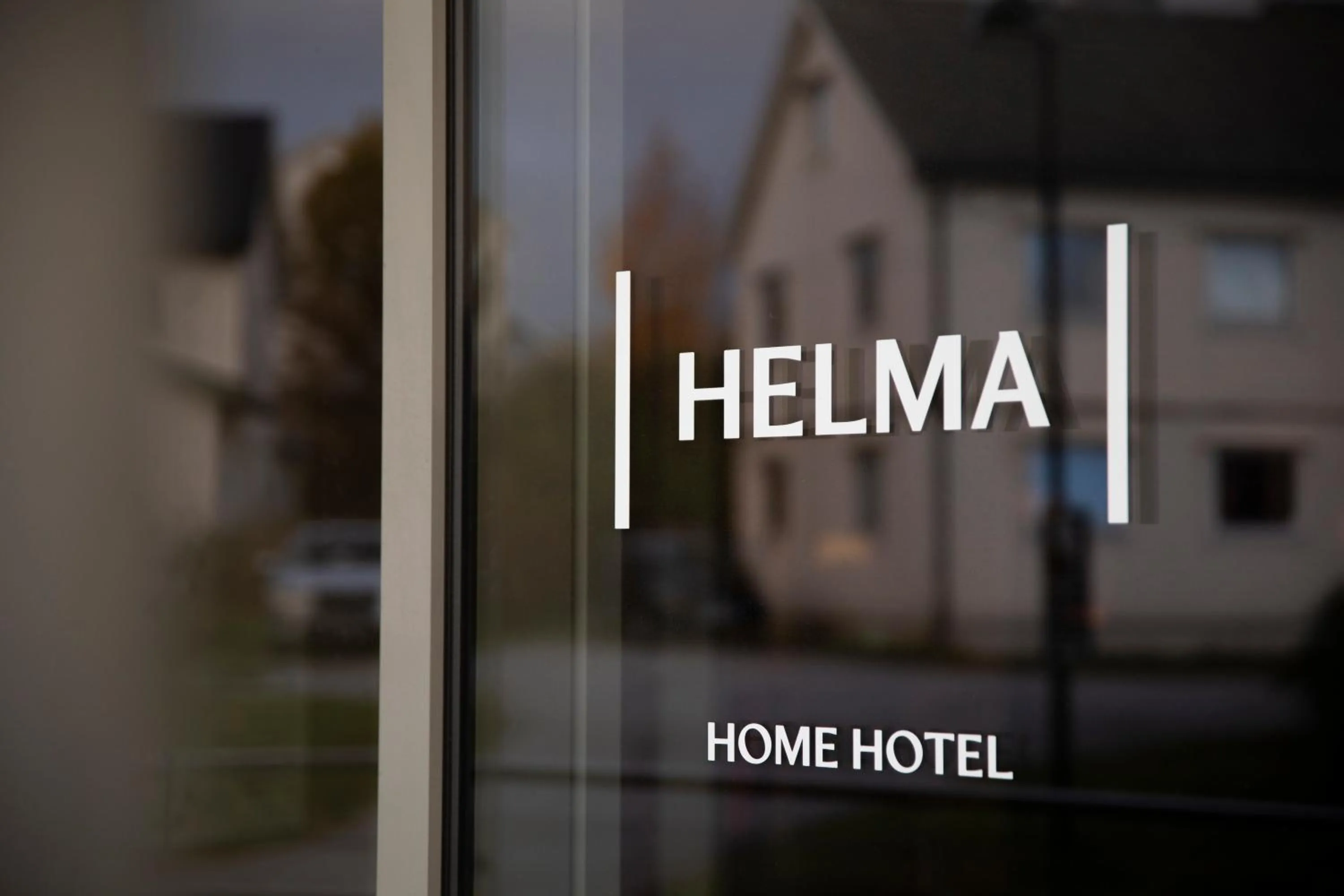 Property logo or sign in Home Hotel Helma