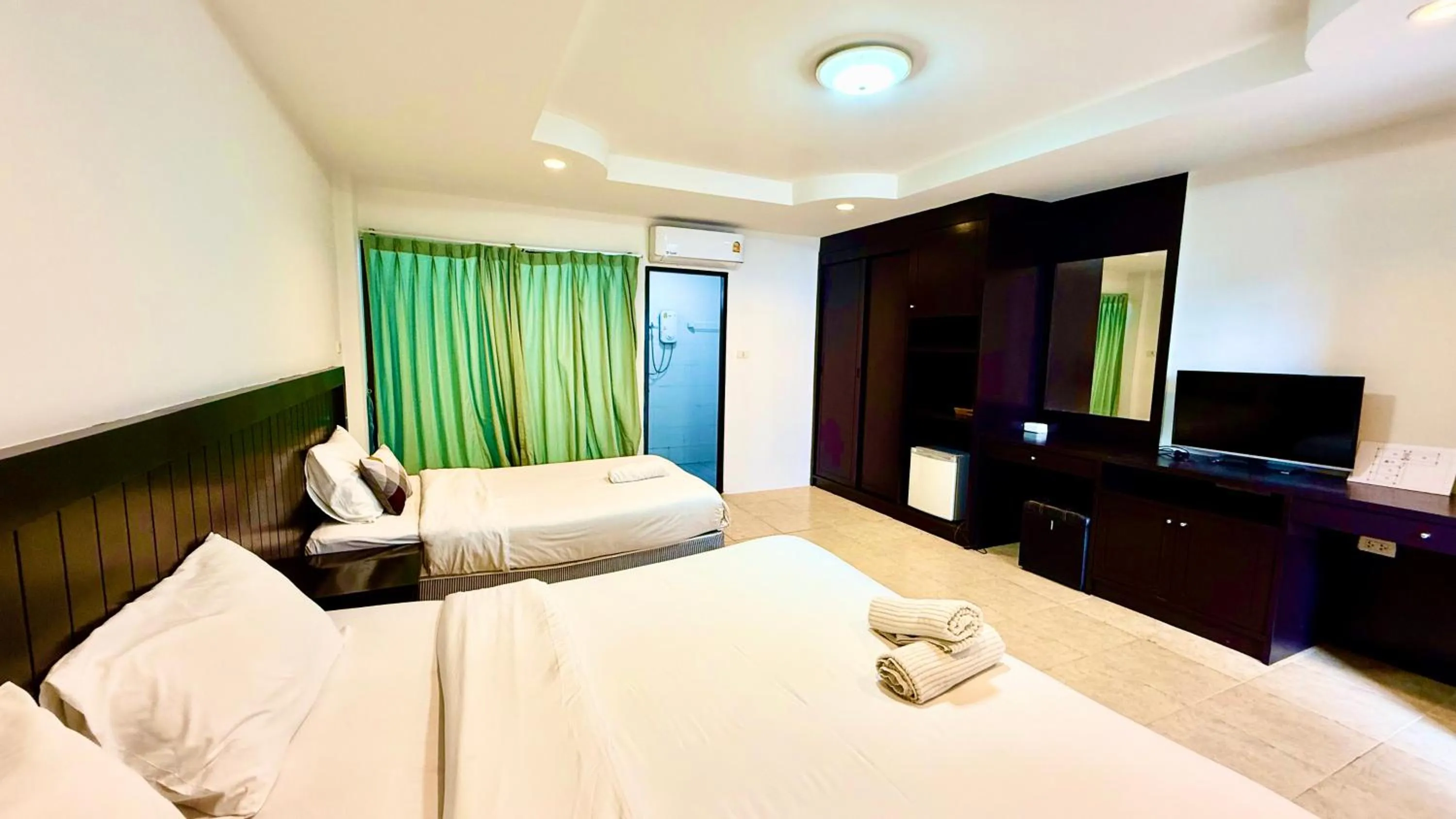 Bed in Hill Side Patong Hotel