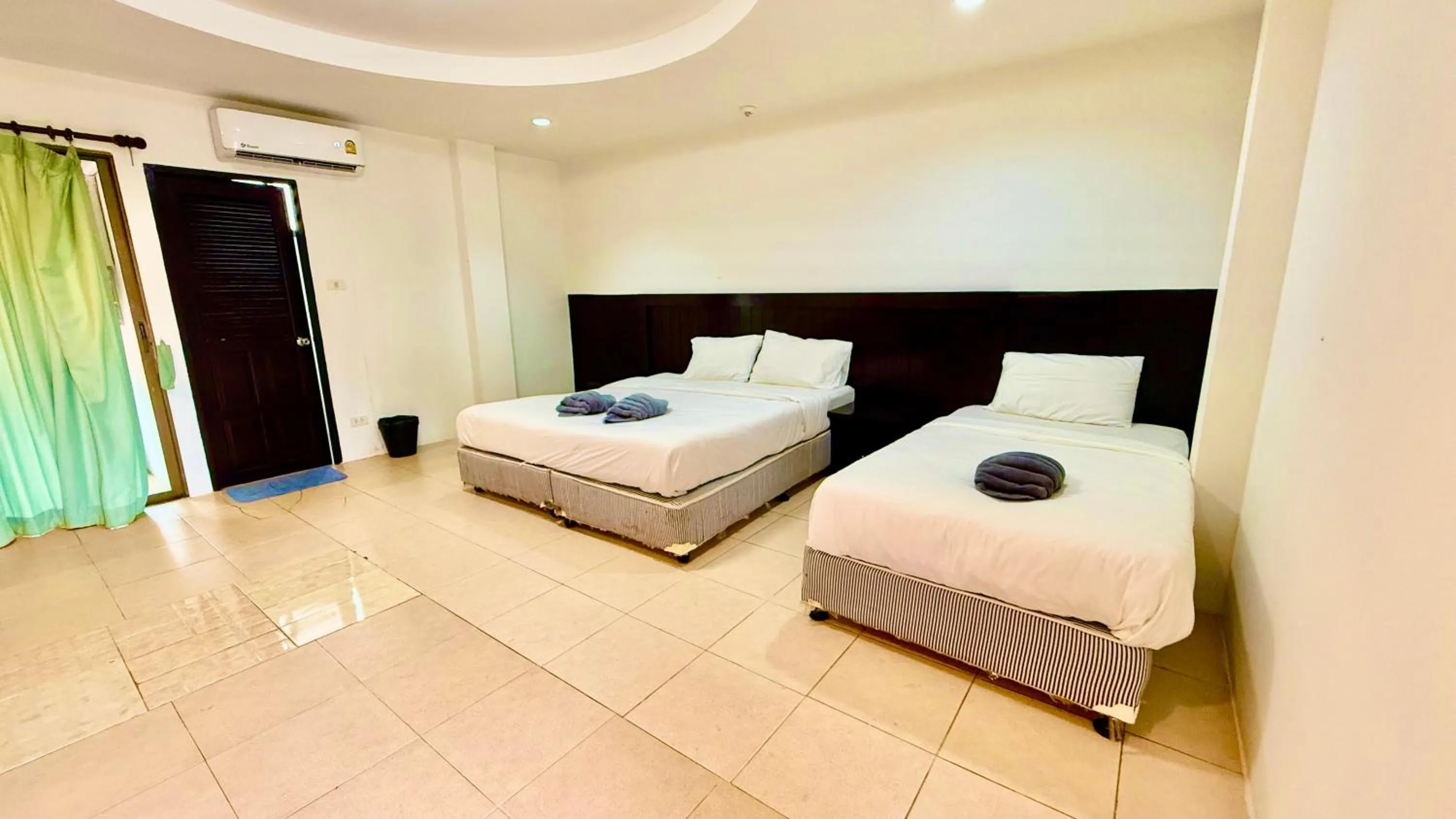 Bed in Hill Side Patong Hotel