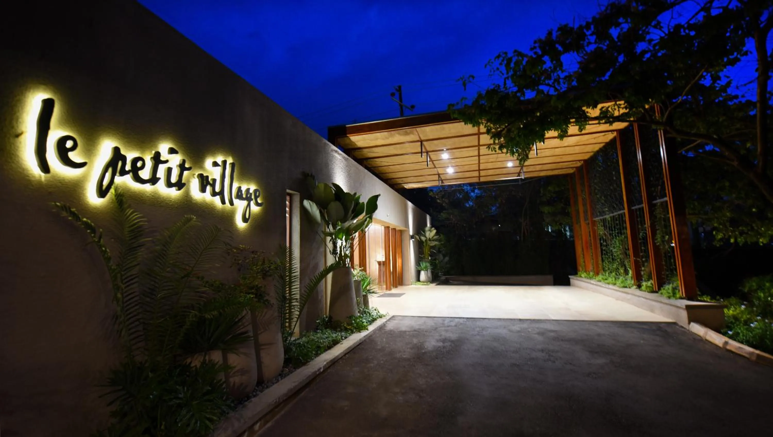Property building in Le Petit Village Boutique Hotel & Spa