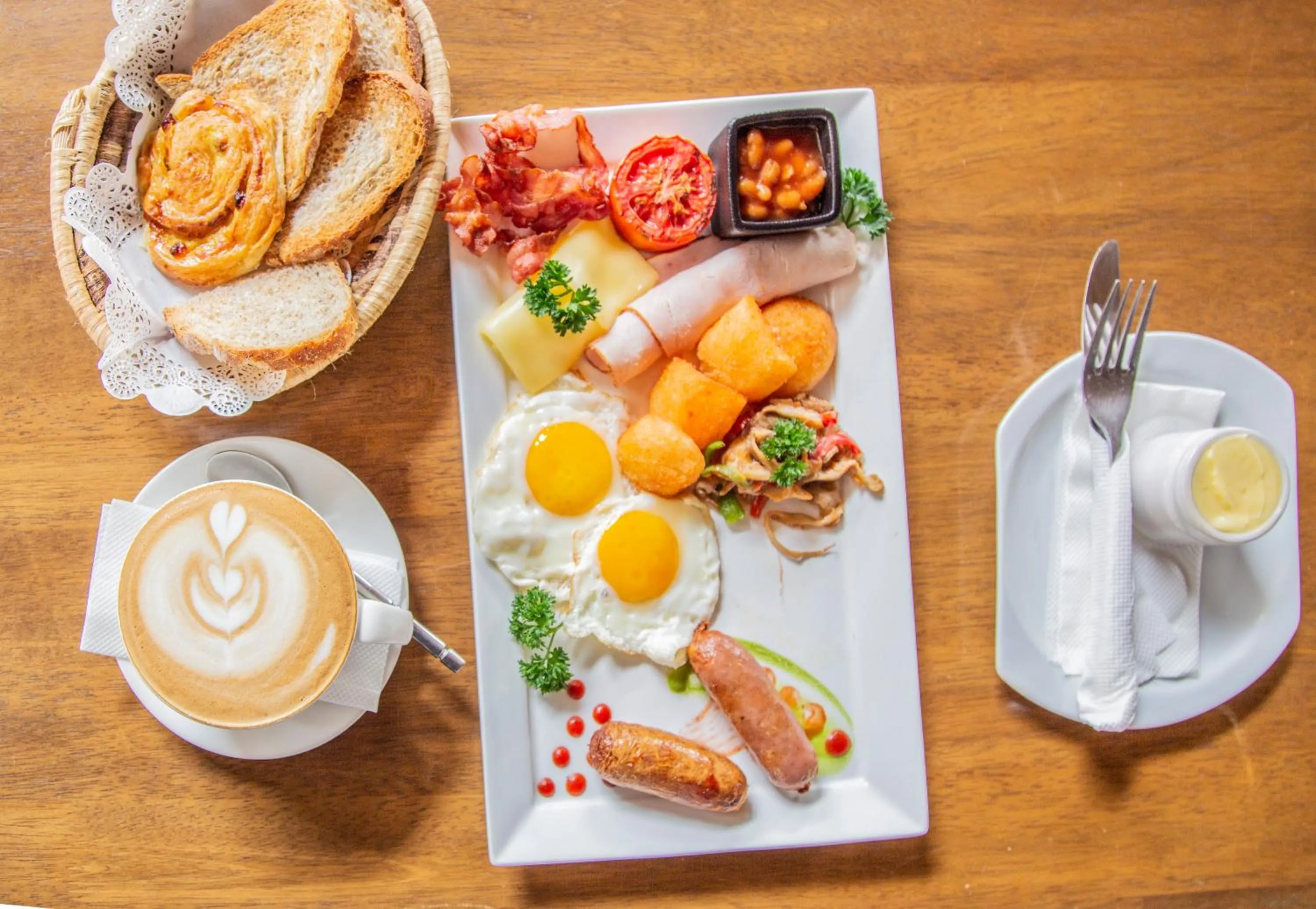 Continental breakfast in Le Petit Village Boutique Hotel & Spa
