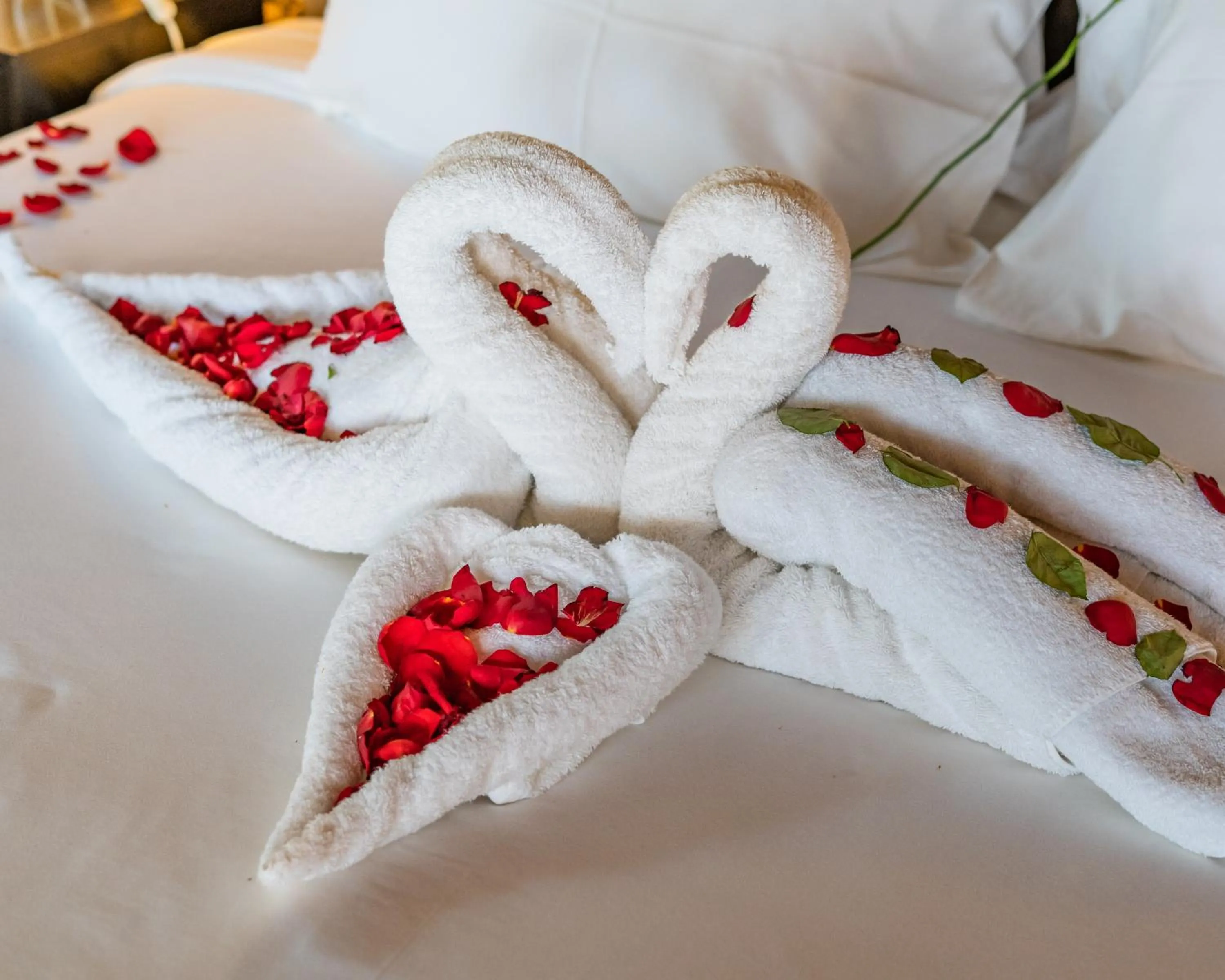 Bed in Le Petit Village Boutique Hotel & Spa