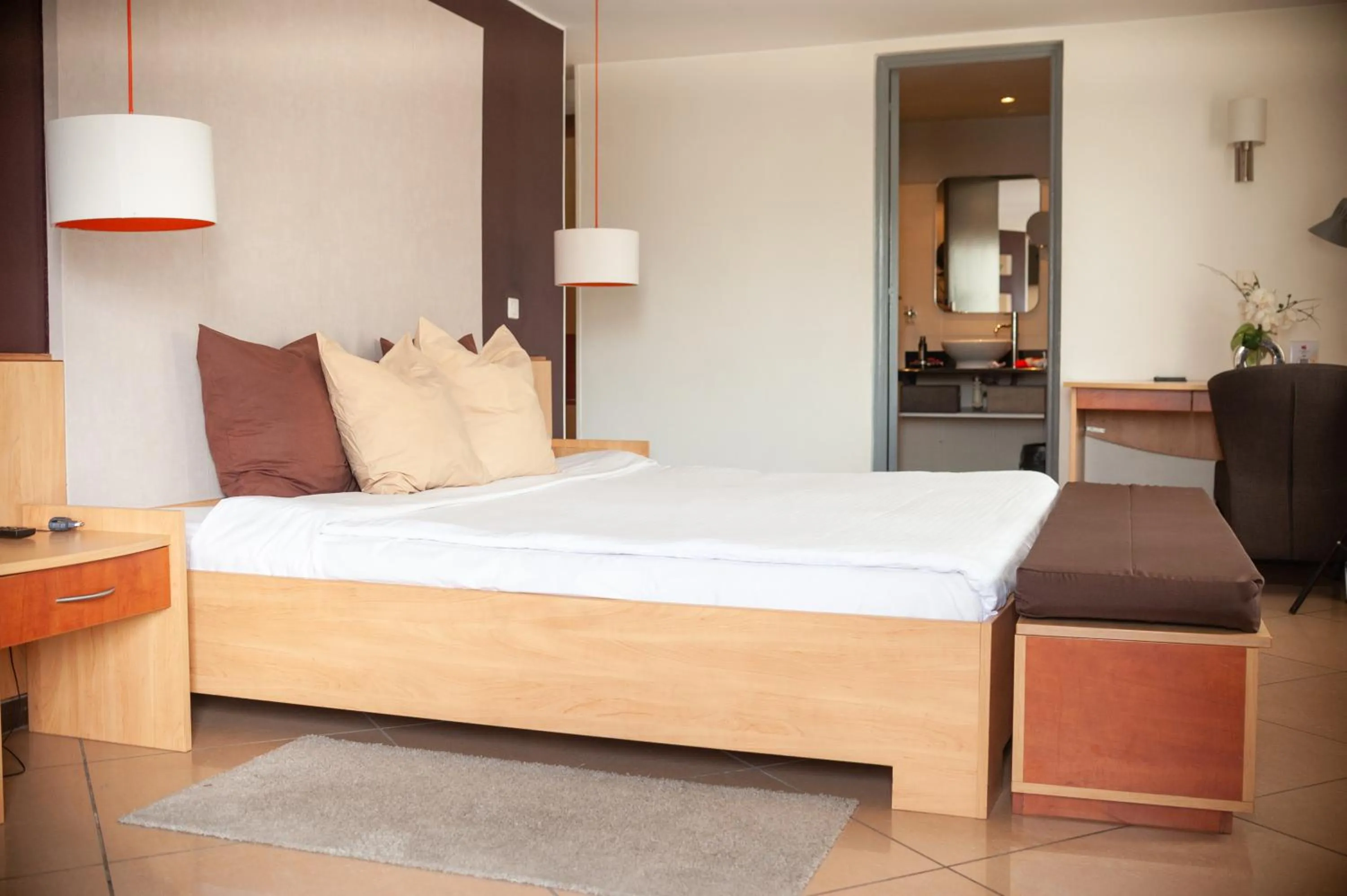 Bed in Le Grand Mellis Hôtel & Spa