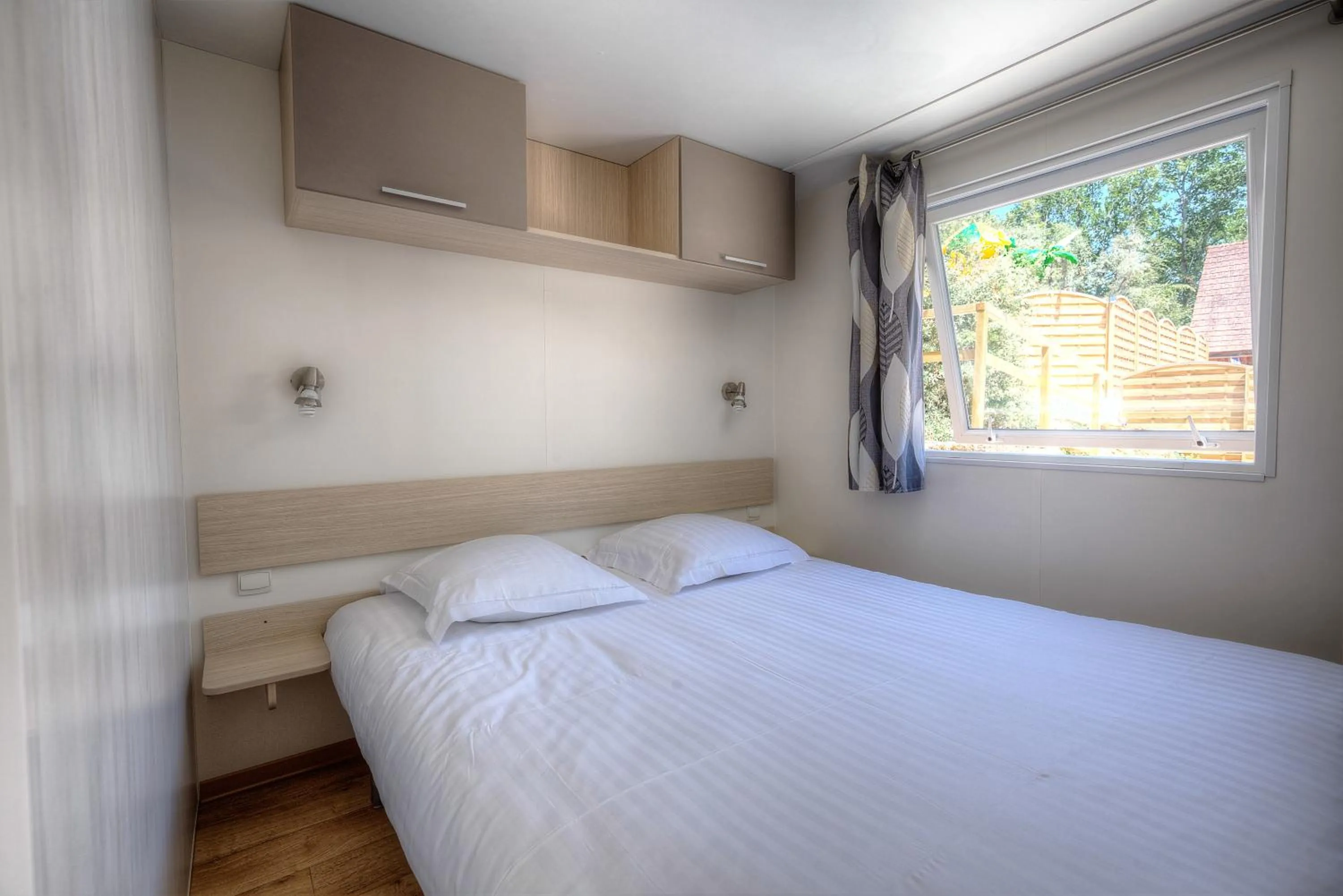 Bedroom in Les Chalets du Périgord