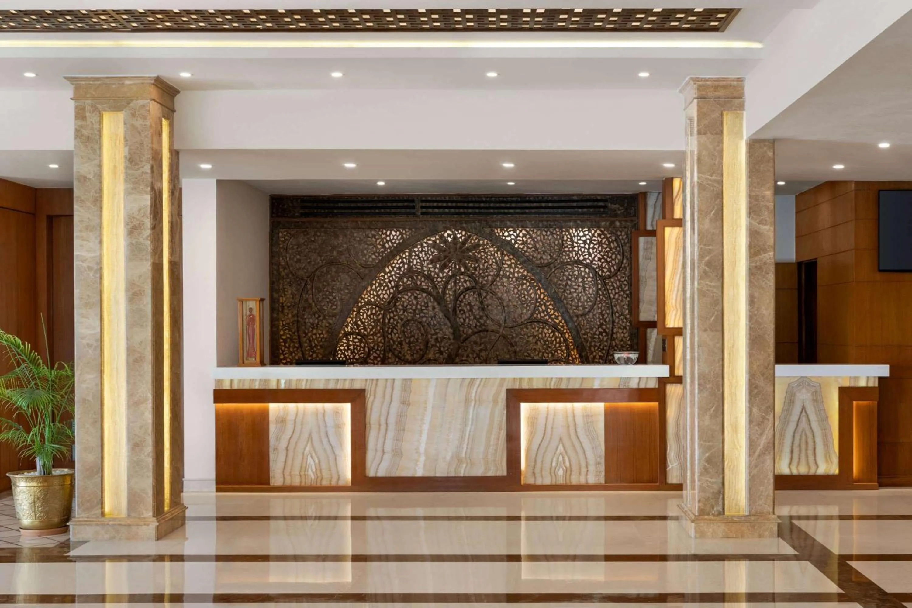 Lobby or reception in Ramada by Wyndham Varanasi Katesar