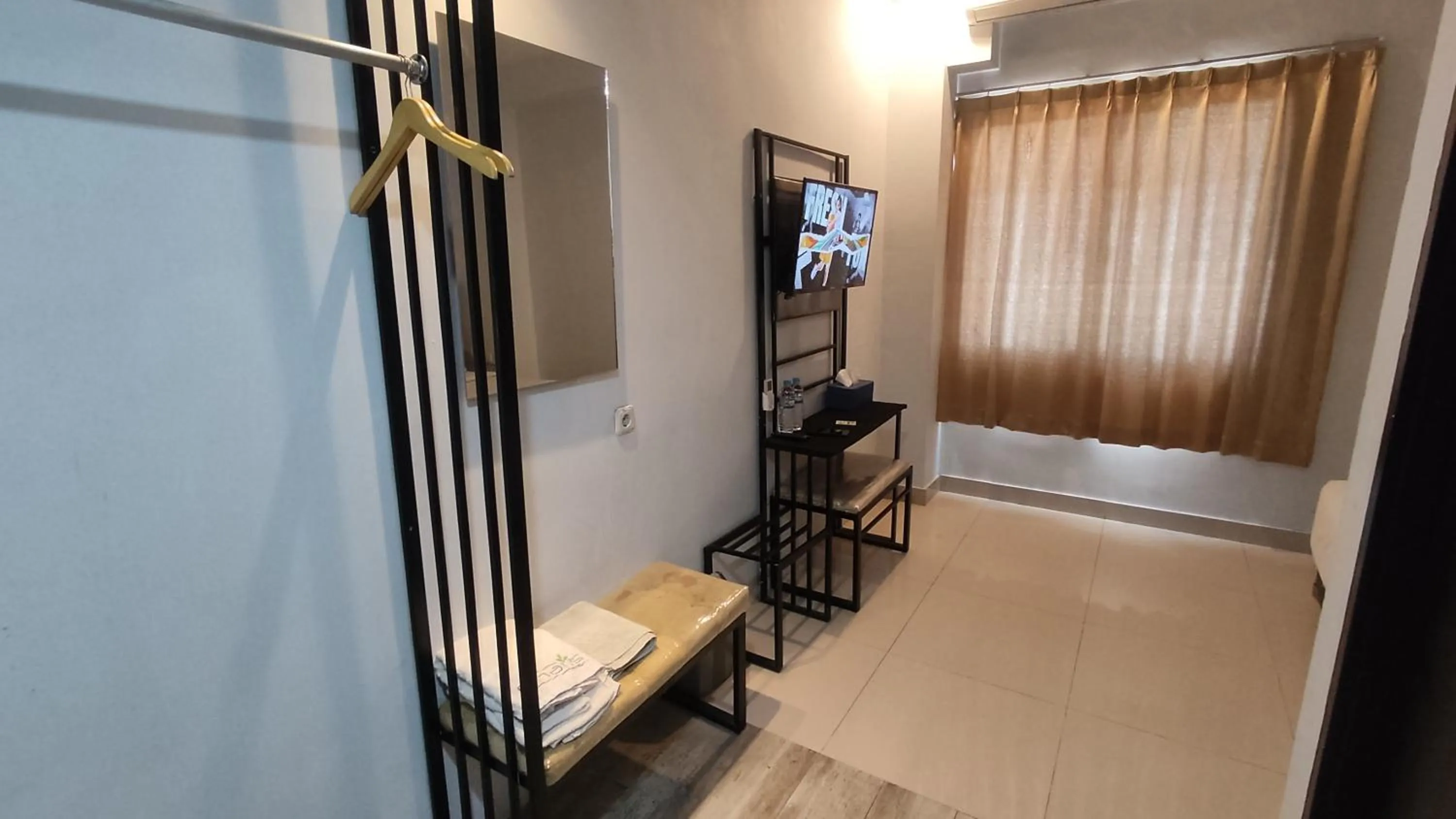 Bedroom in De La Charis Hotel by Waringin Hospitality