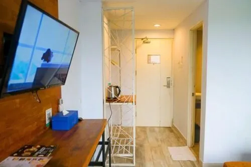 TV and multimedia in De La Charis Hotel by Waringin Hospitality