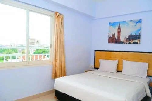 Bedroom, Bed in De La Charis Hotel by Waringin Hospitality