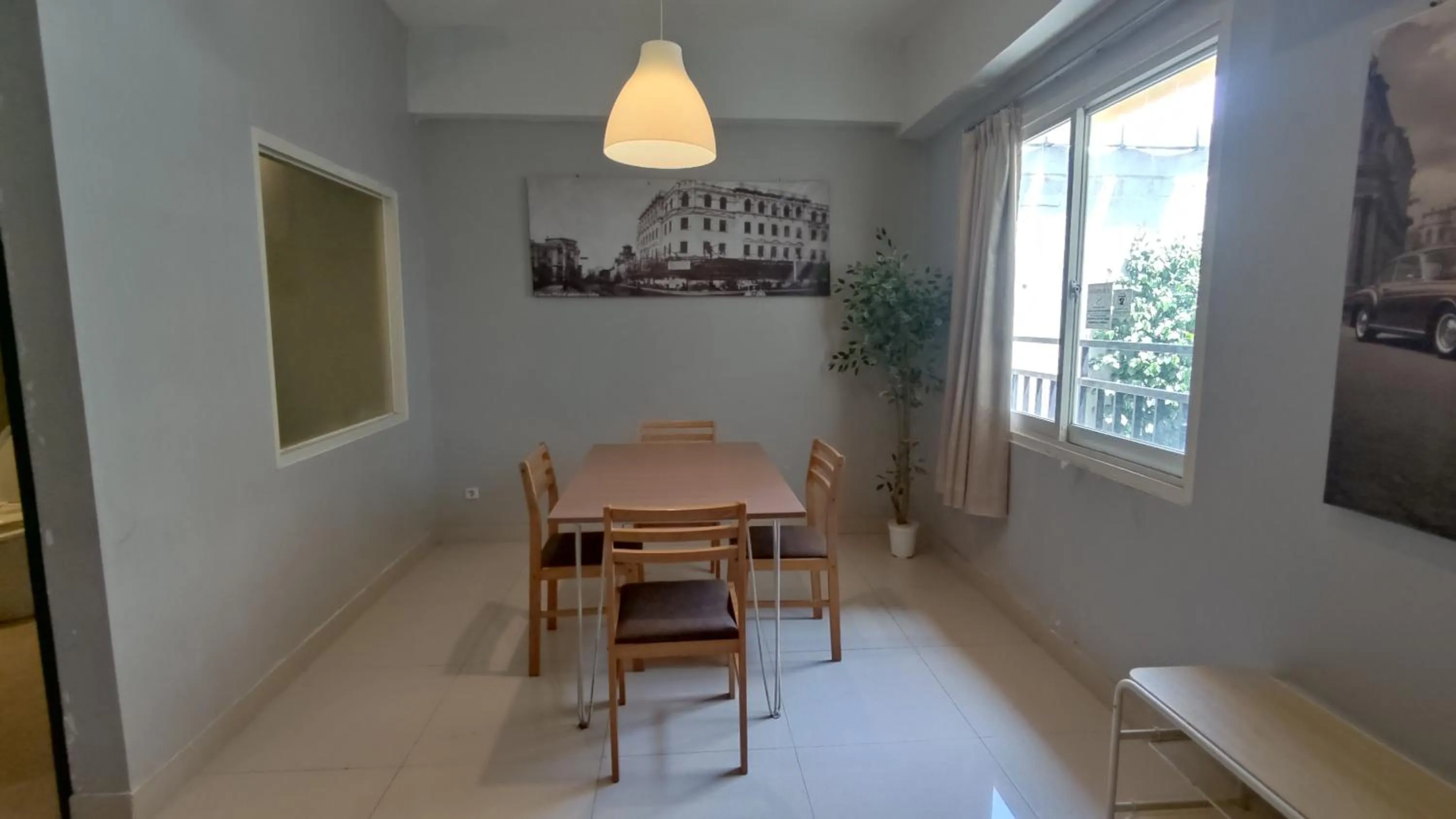 Dining area in De La Charis Hotel by Waringin Hospitality