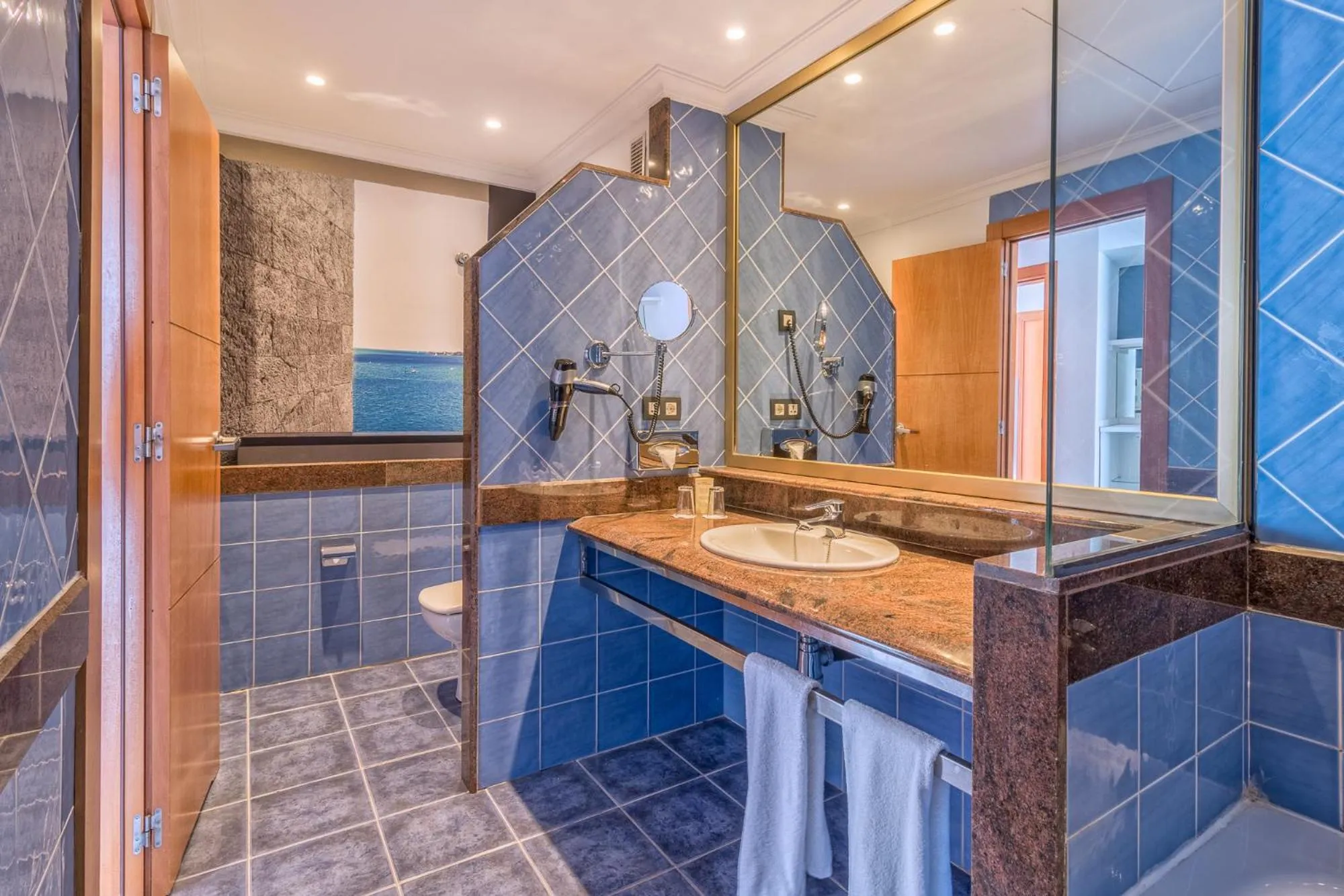 Bathroom in Hotel Mirador Papagayo by LIVVO