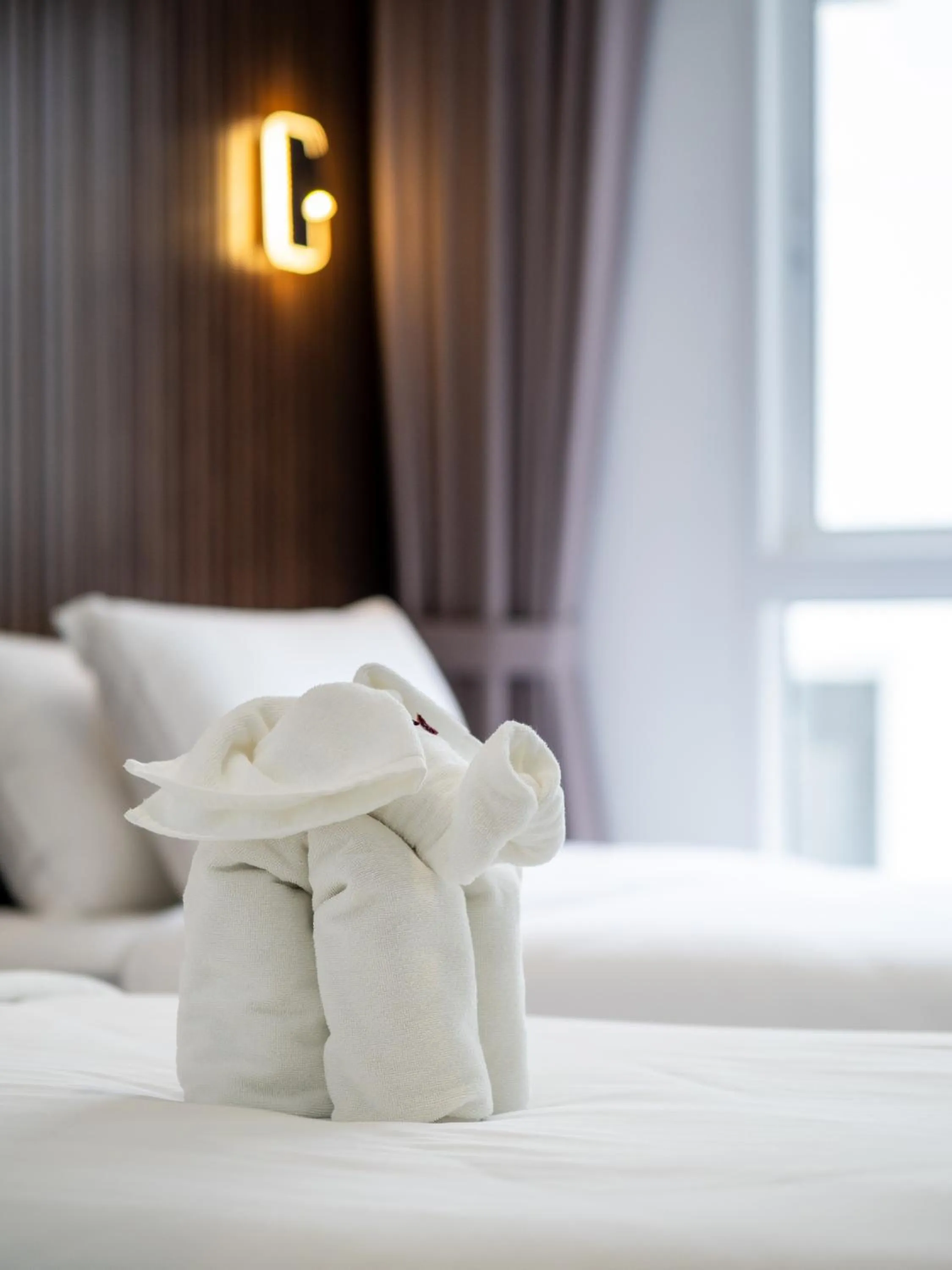 Bed in Samutprakarn Hotel