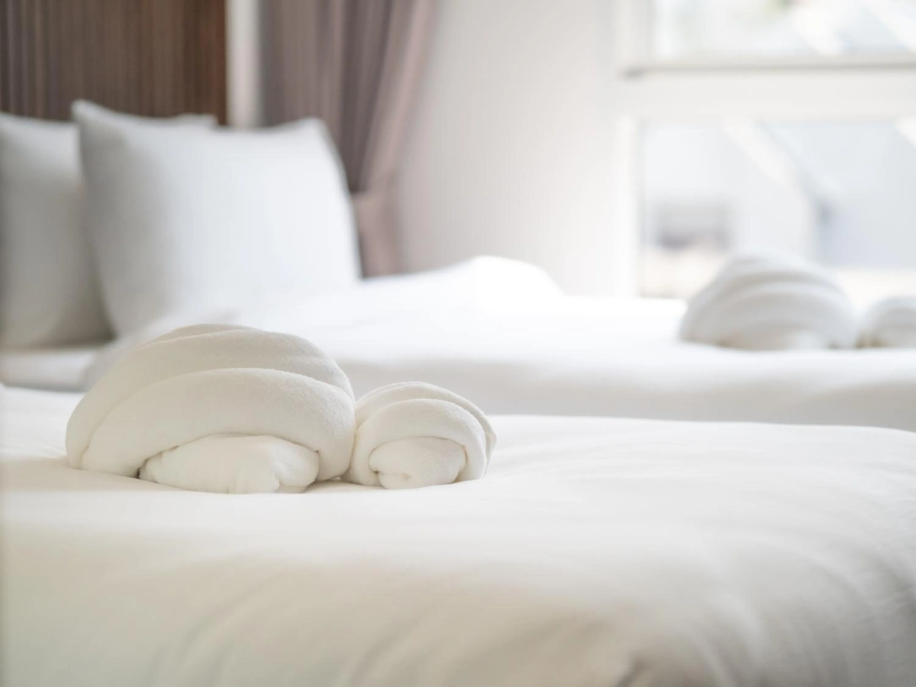 Bed in Samutprakarn Hotel