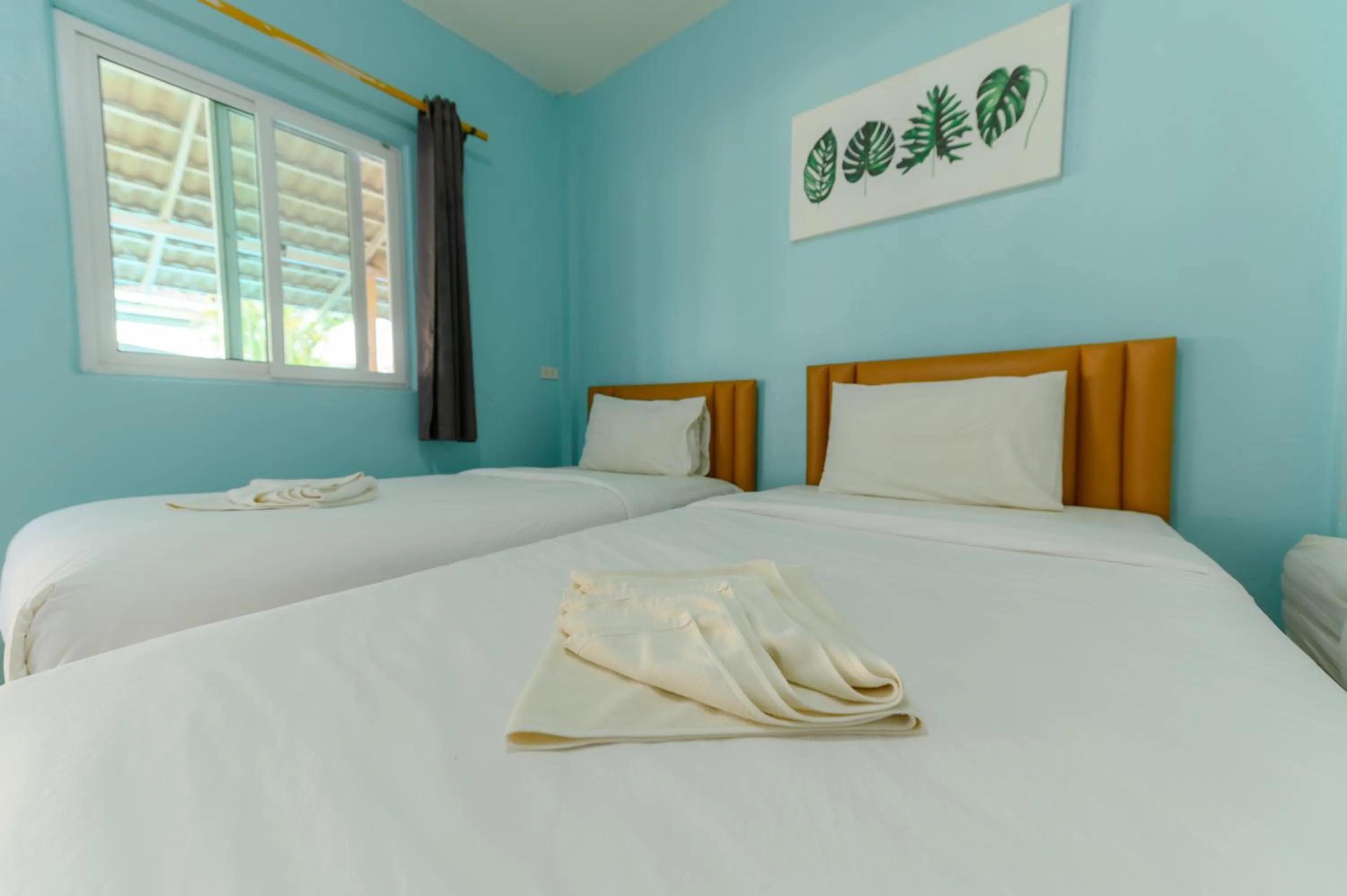 Bed in Kongkhamkoon Hotel