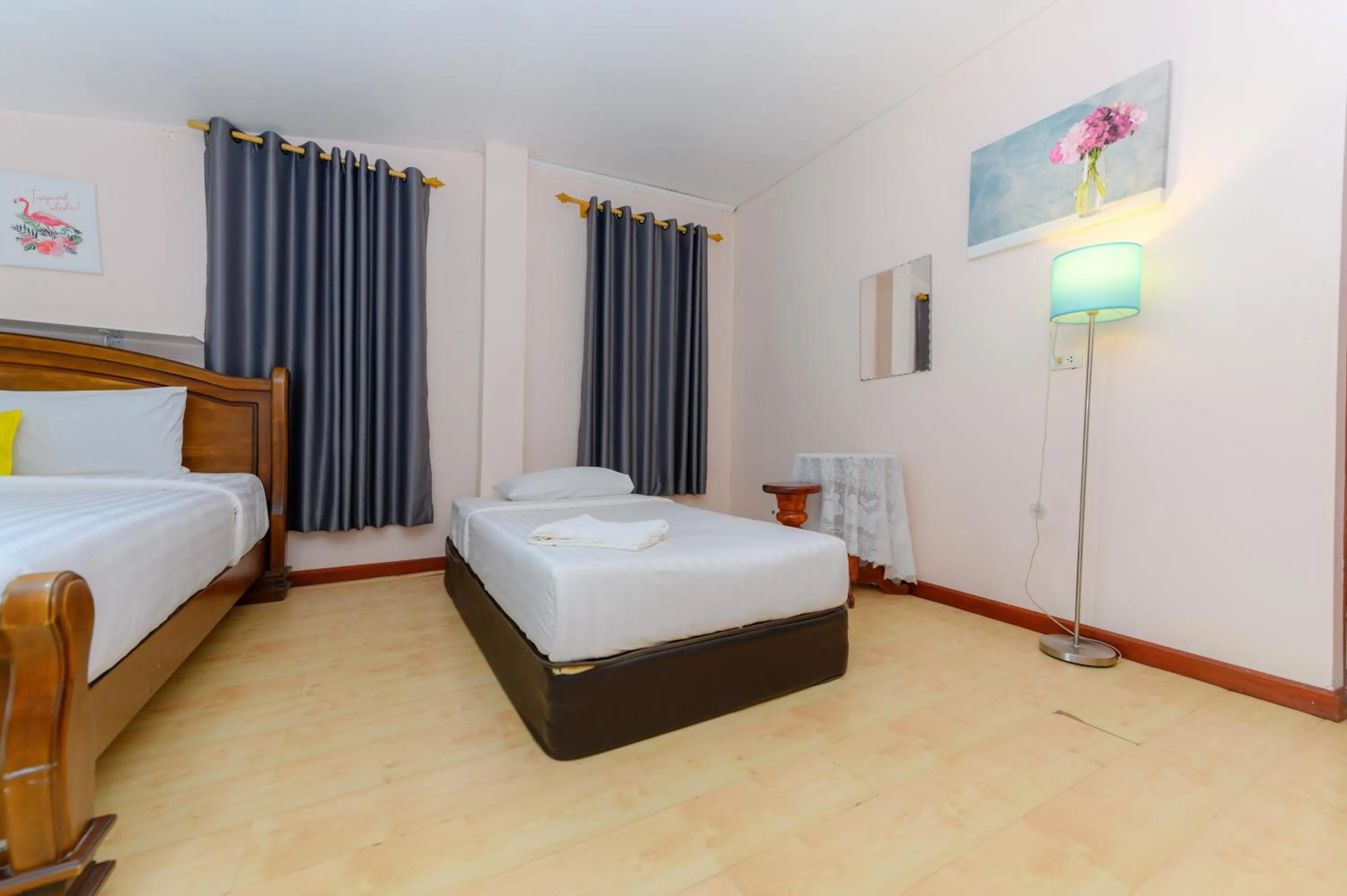 Bed in Kongkhamkoon Hotel