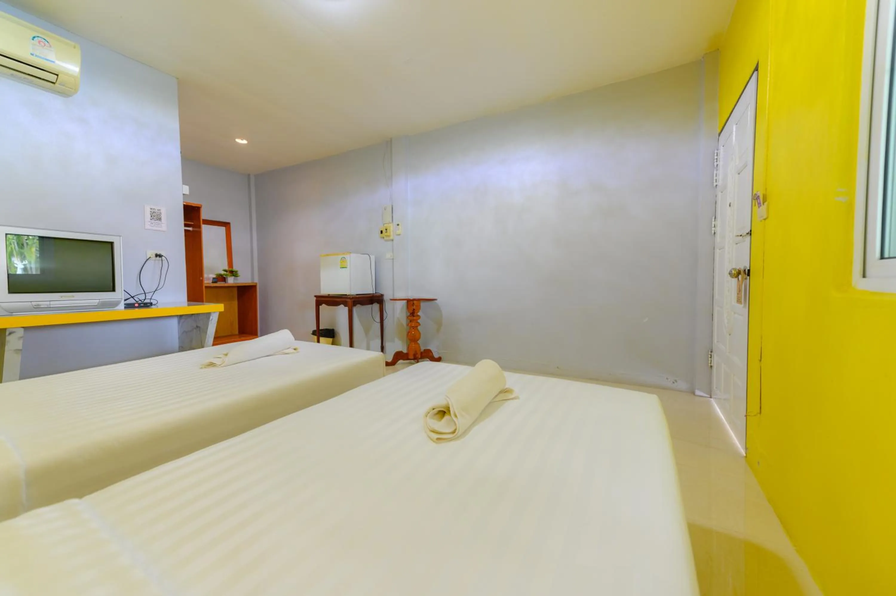 Bed in Kongkhamkoon Hotel