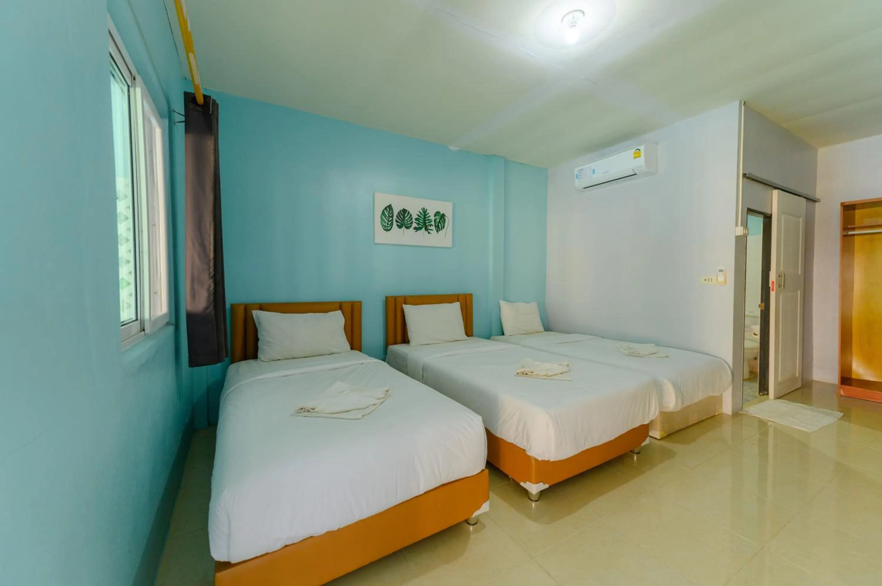 Bed in Kongkhamkoon Hotel