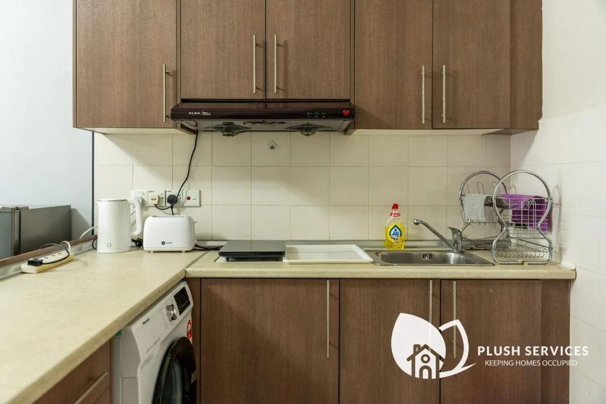 Kitchen or kitchenette in Windsor Tower Sri Hartamas by Plush