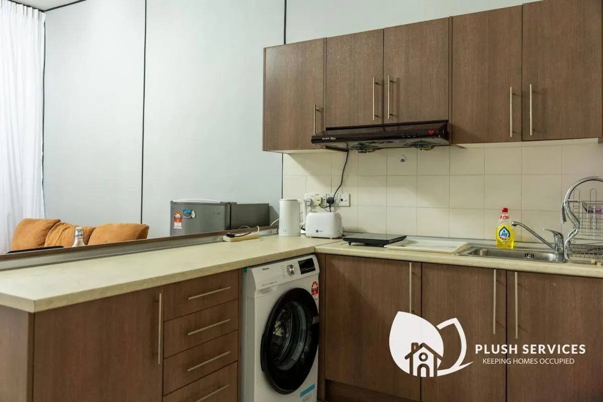 Kitchen or kitchenette in Windsor Tower Sri Hartamas by Plush