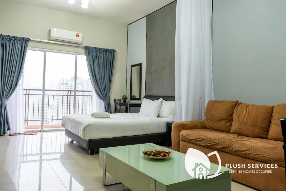 Living room, Bed in Windsor Tower Sri Hartamas by Plush