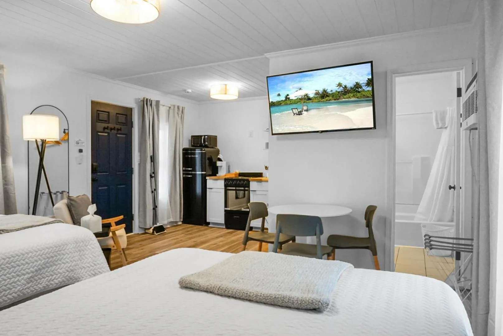 Bed in The Boardwalk Inn