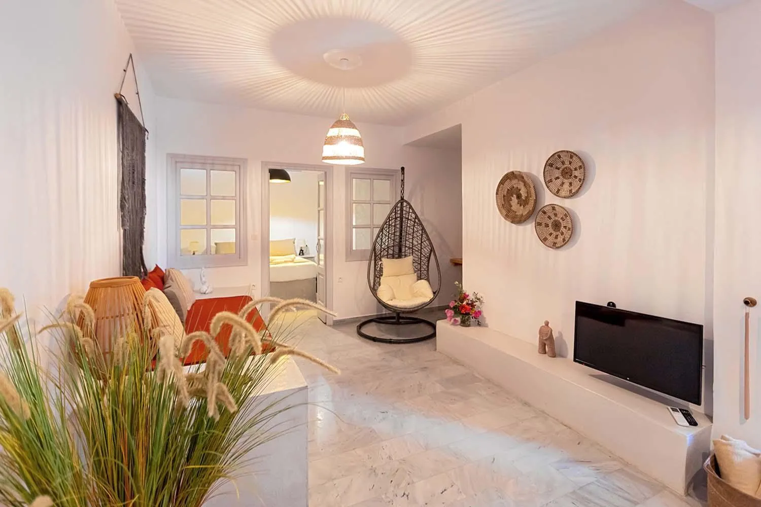 Bed in Phaos Santorini Suites