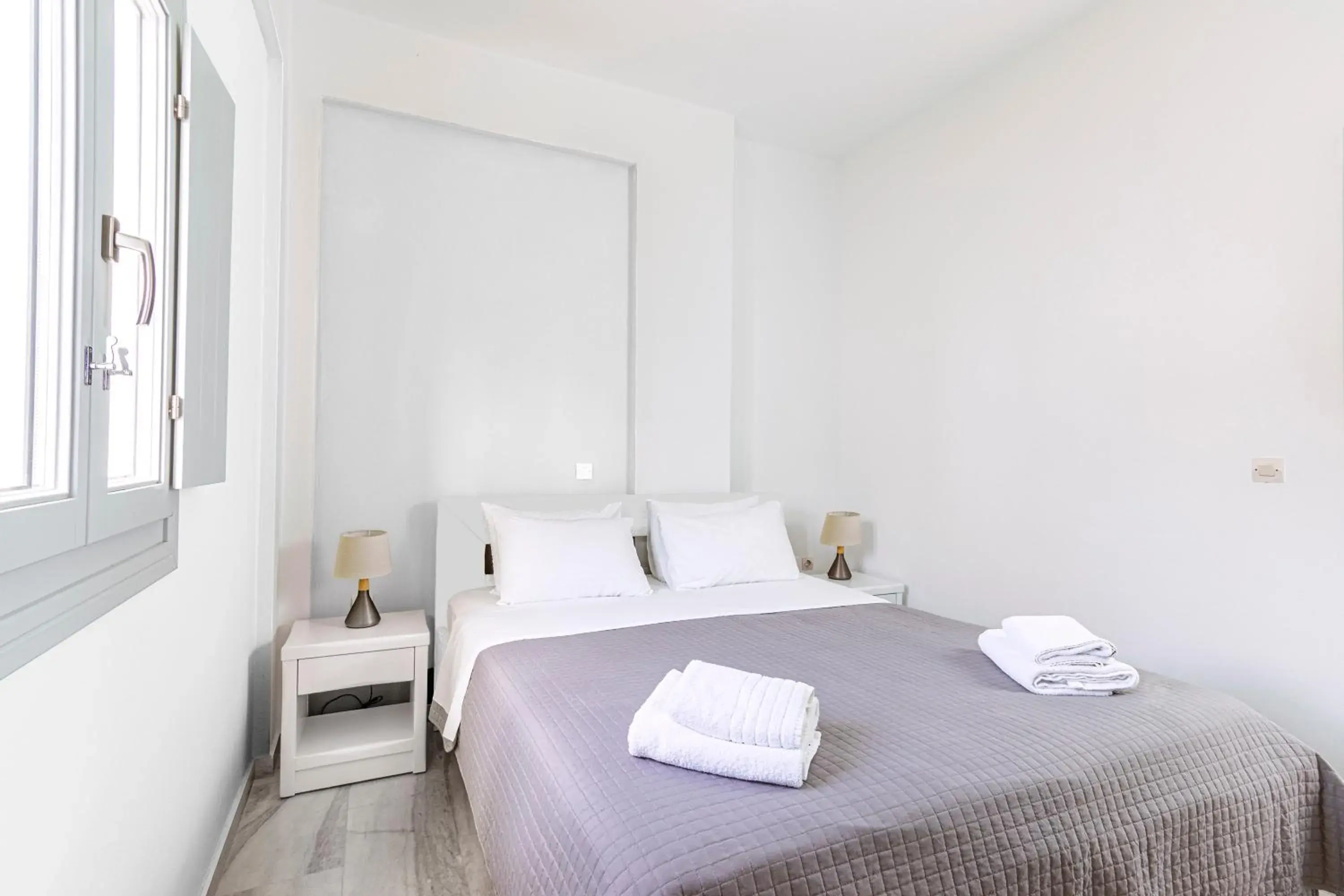 Bed in Phaos Santorini Suites Bed in Phaos Santorini Suites