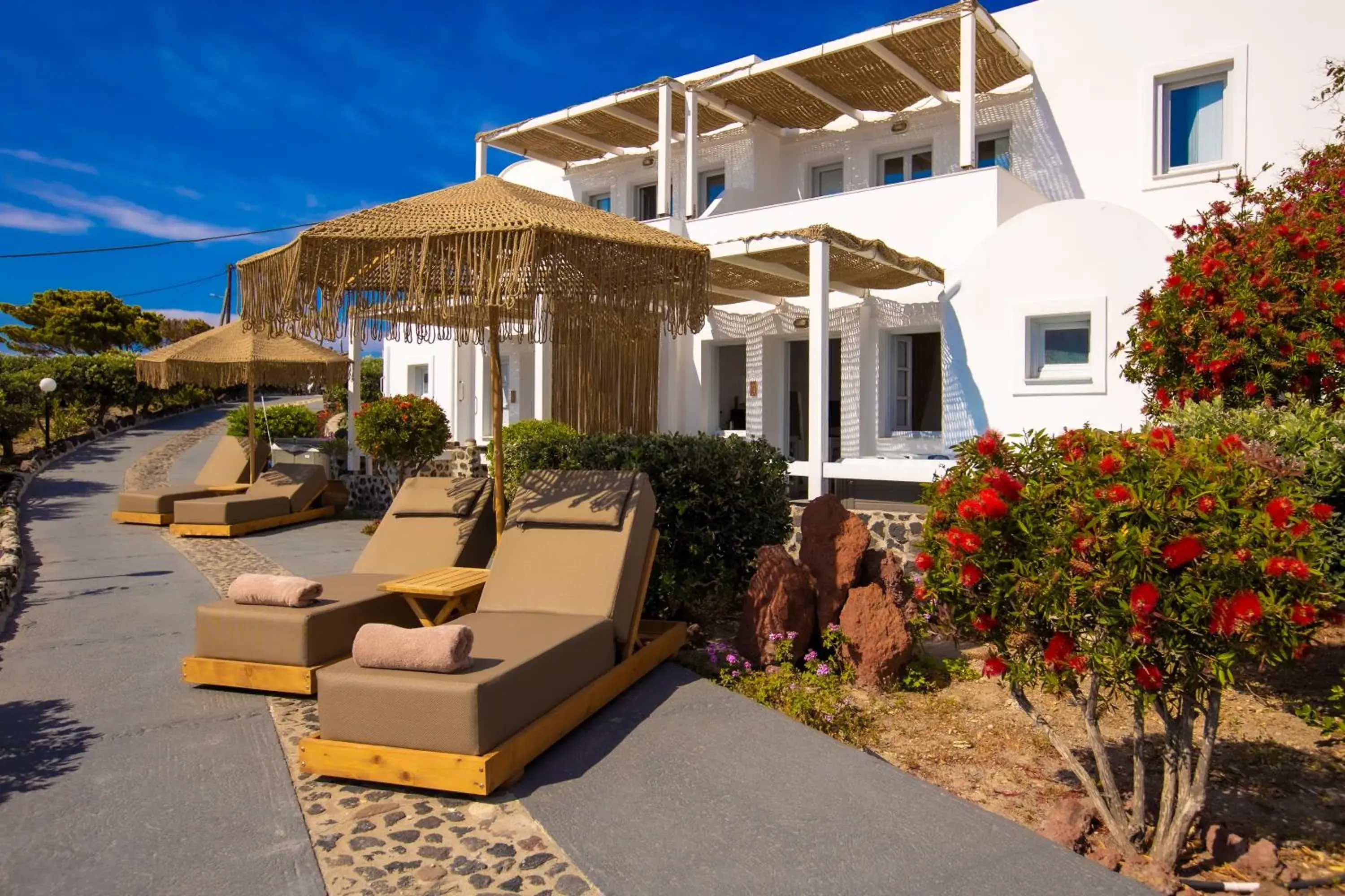 Deluxe Suite with Hot Tub and Sea View in Phaos Santorini Suites Deluxe Suite with Hot Tub and Sea View in Phaos Santorini Suites