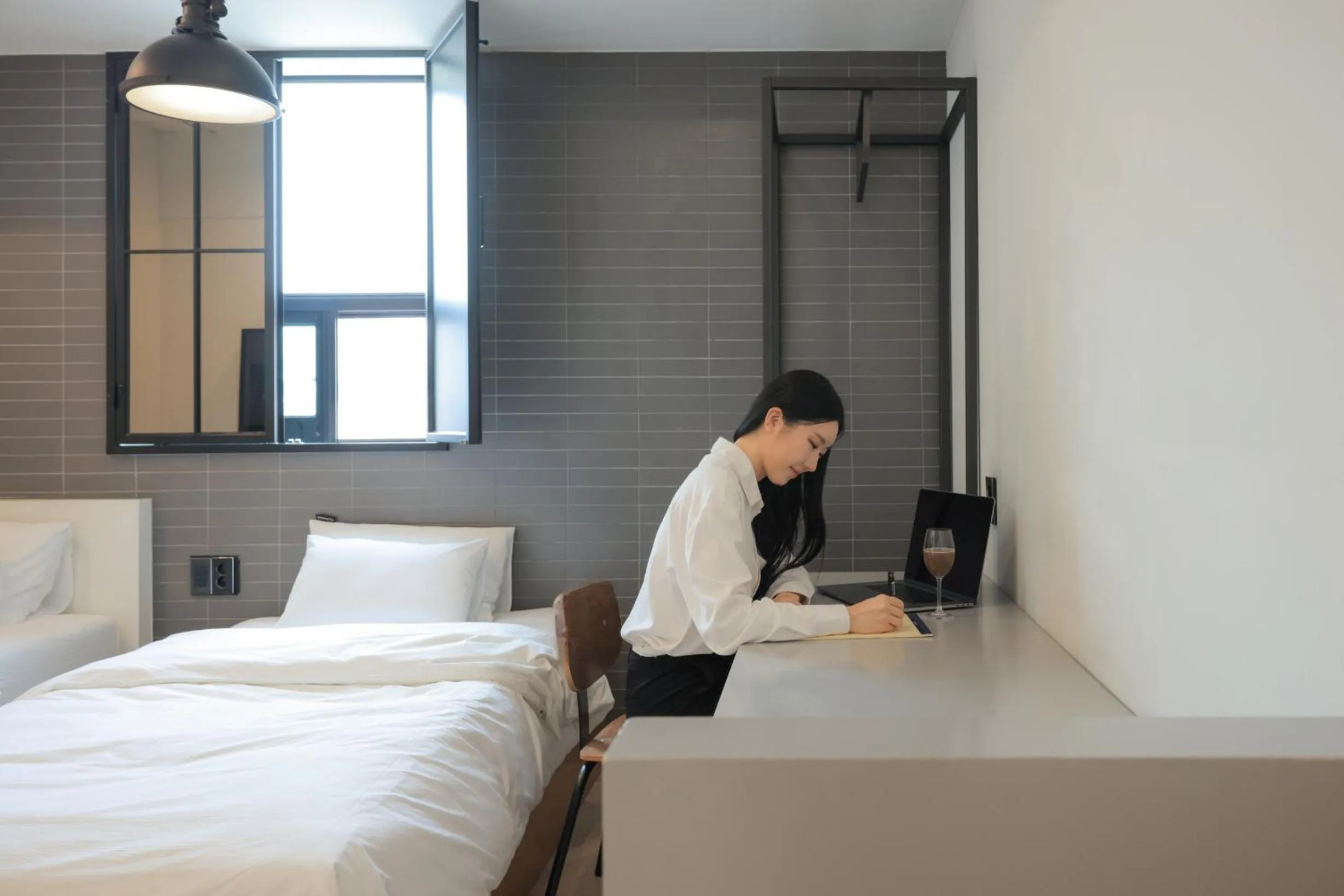 Seating area, Bed in Hotel Yaja Siheung Jeongwang