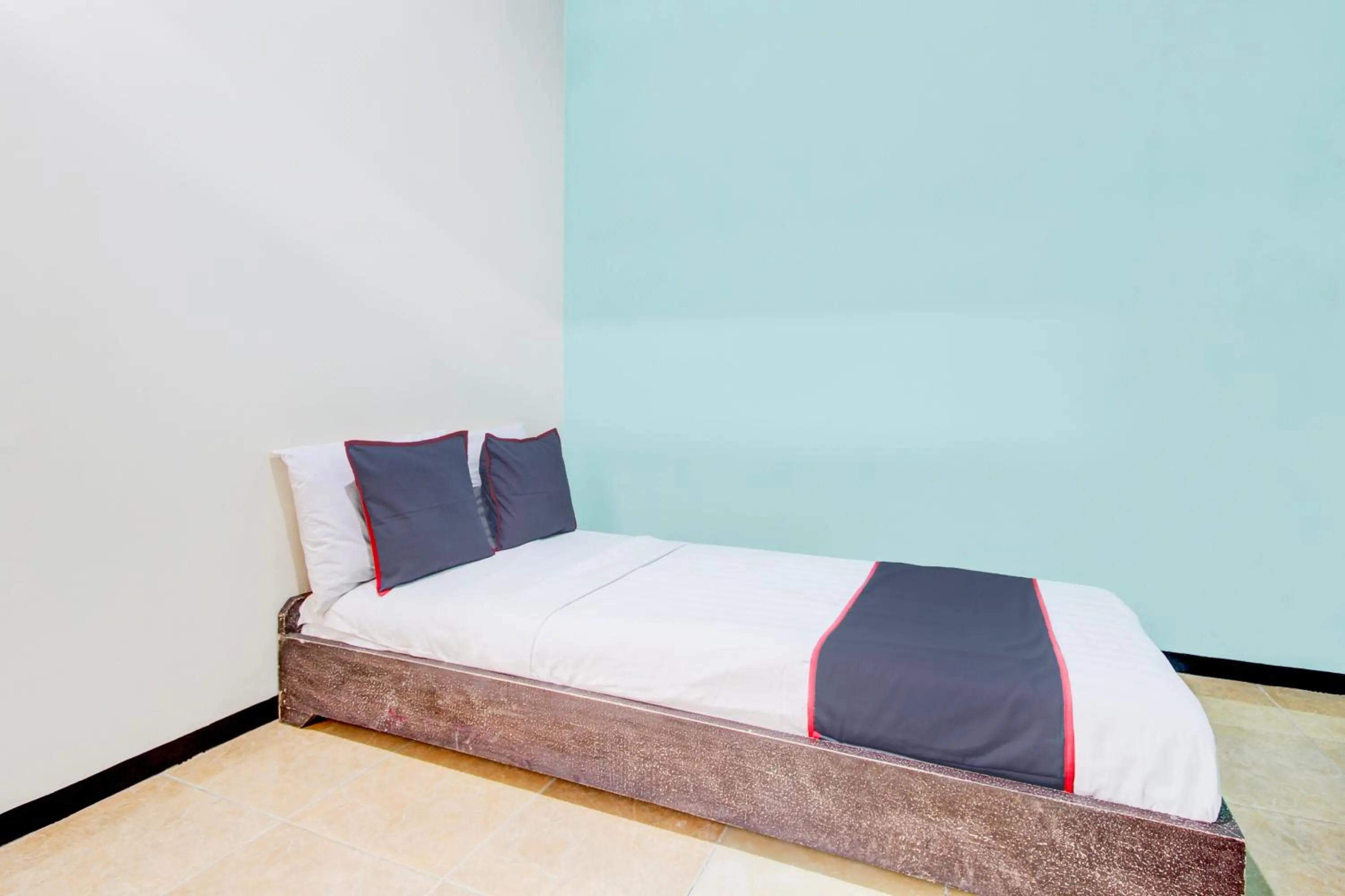 Bedroom, Bed in Hotel O Purwokerto Near Alun Alun Purwokerto Formerly Guest House Rania