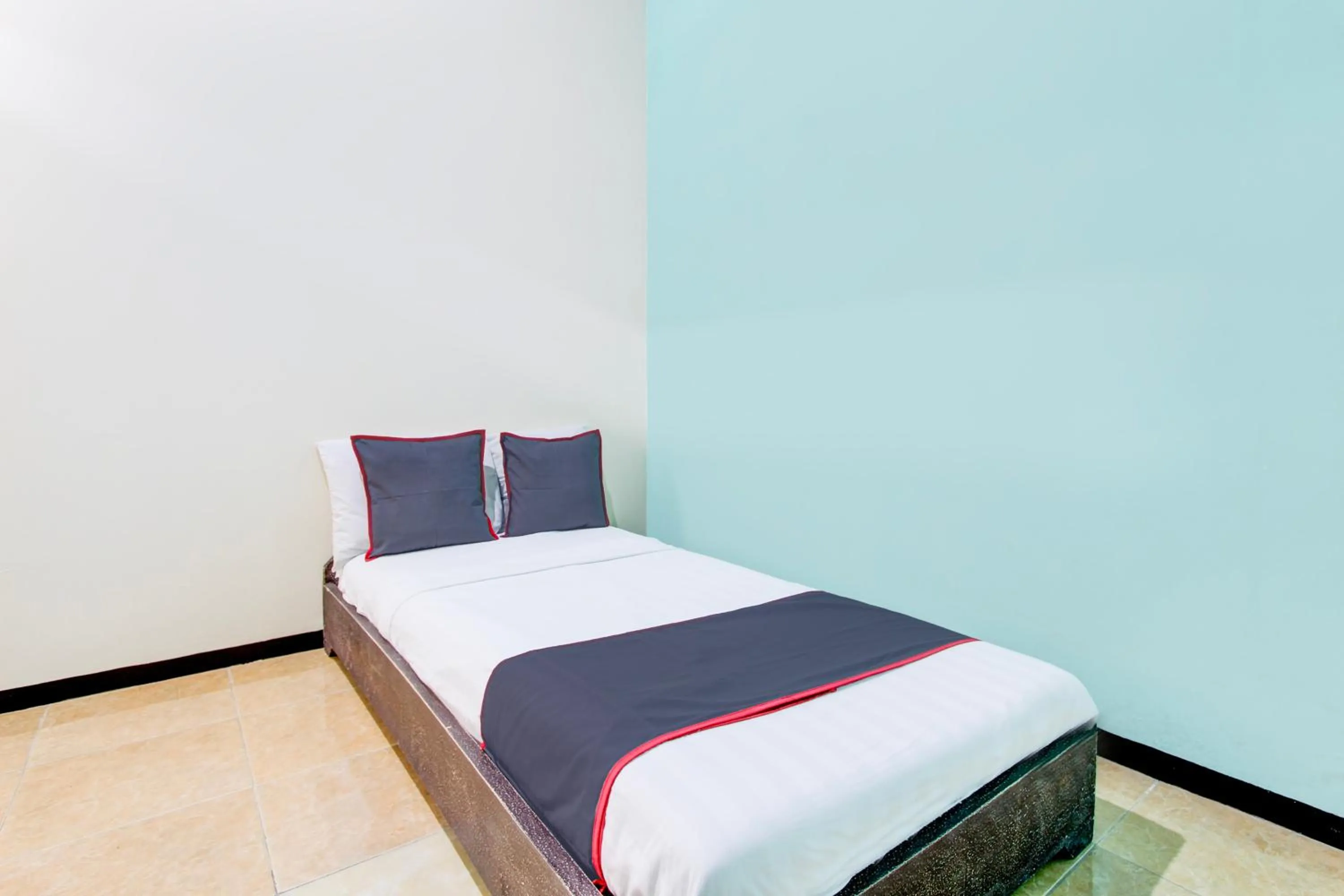 Bedroom, Bed in Hotel O Purwokerto Near Alun Alun Purwokerto Formerly Guest House Rania