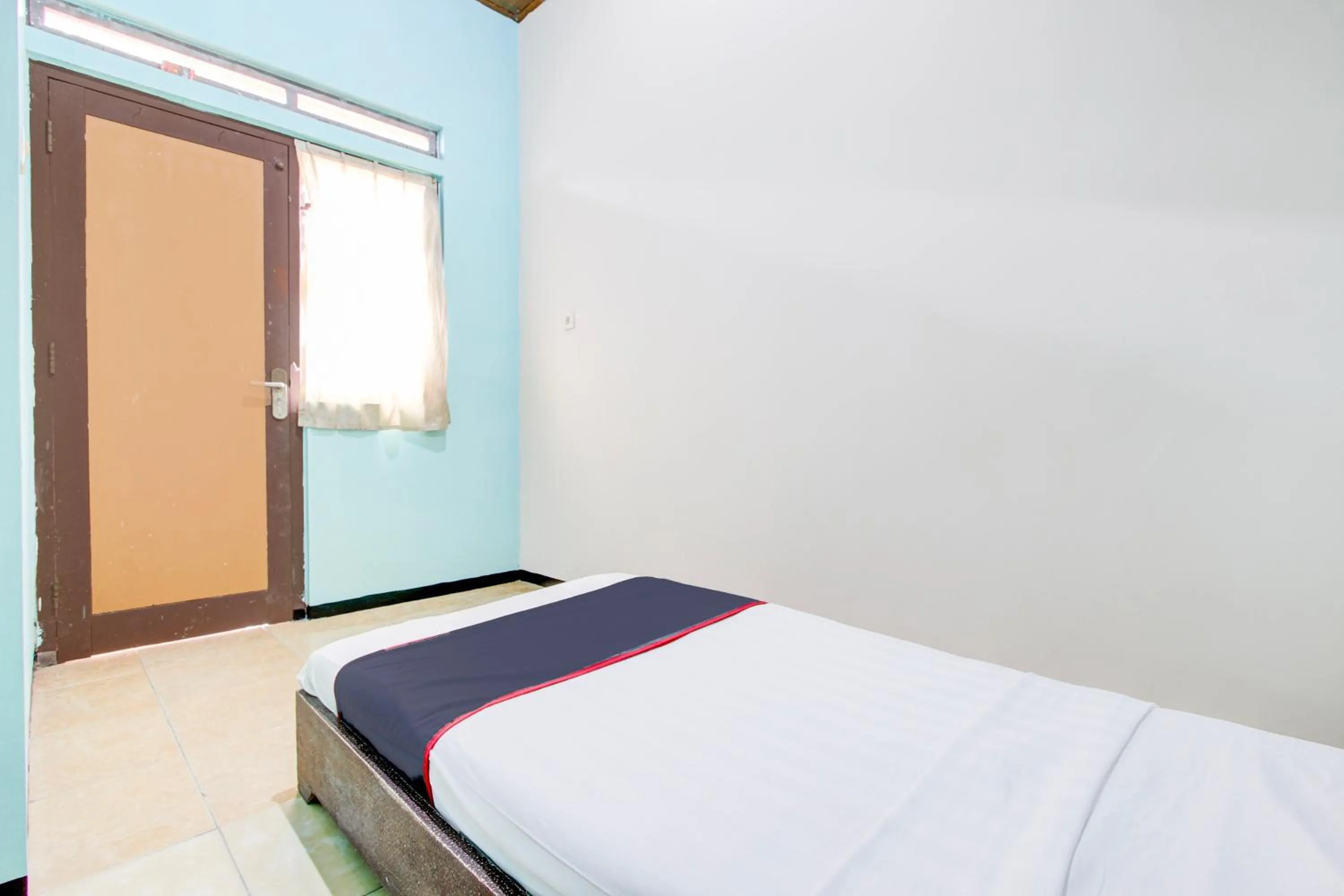 Bedroom, Bed in Hotel O Purwokerto Near Alun Alun Purwokerto Formerly Guest House Rania