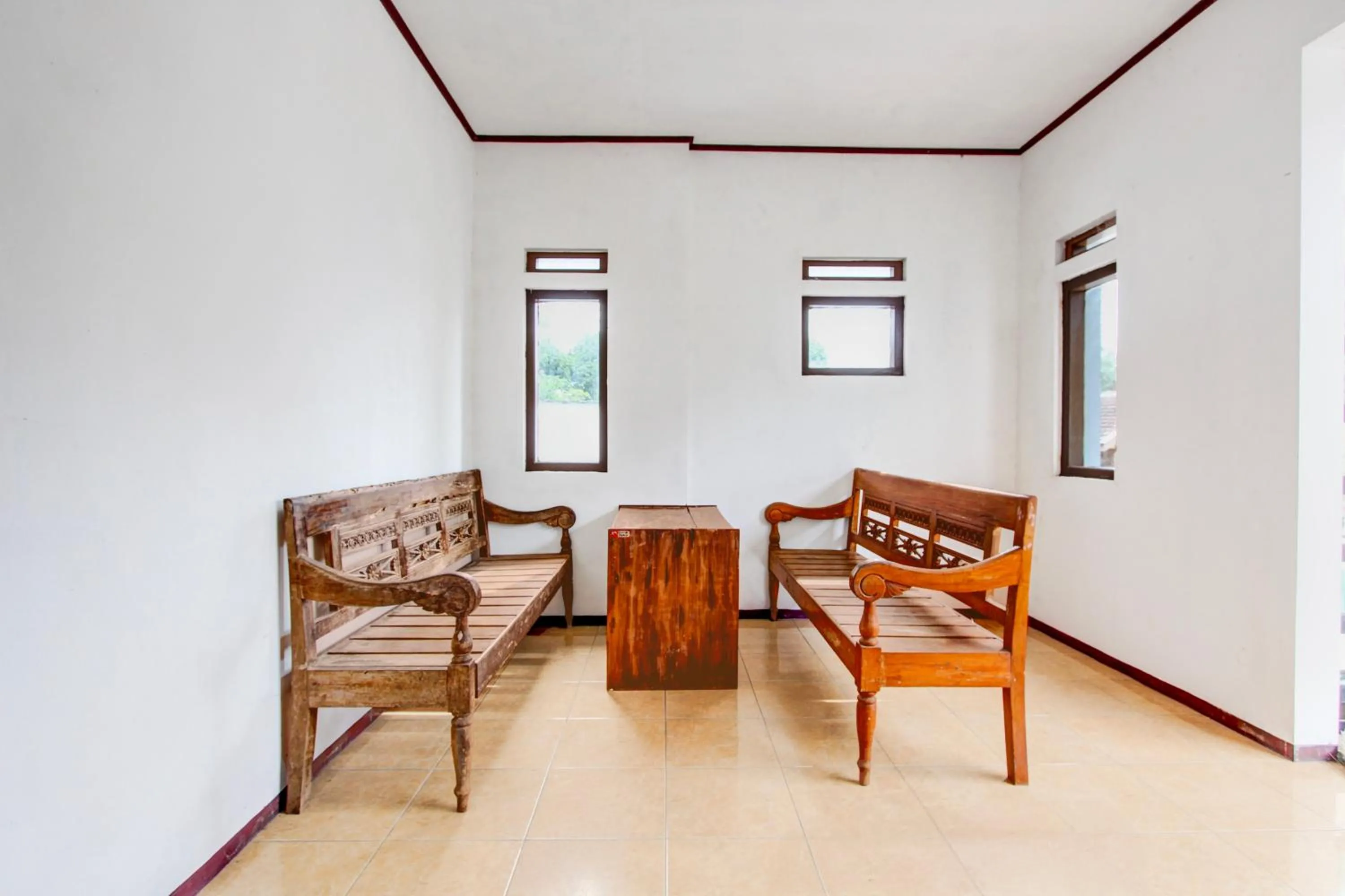 Seating area in Hotel O Purwokerto Near Alun Alun Purwokerto Formerly Guest House Rania