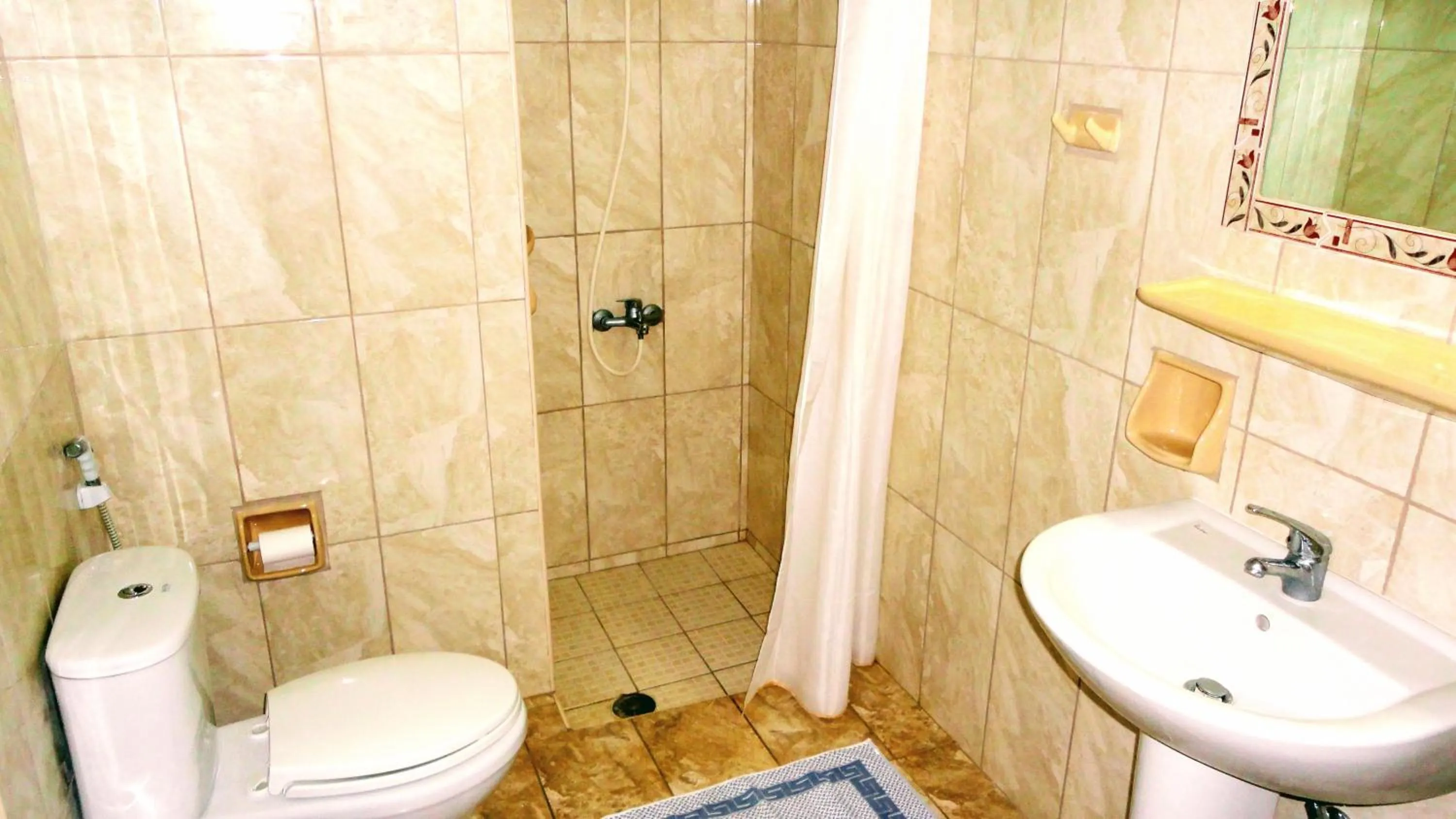 Bathroom in Ibiscus Hotel Malia