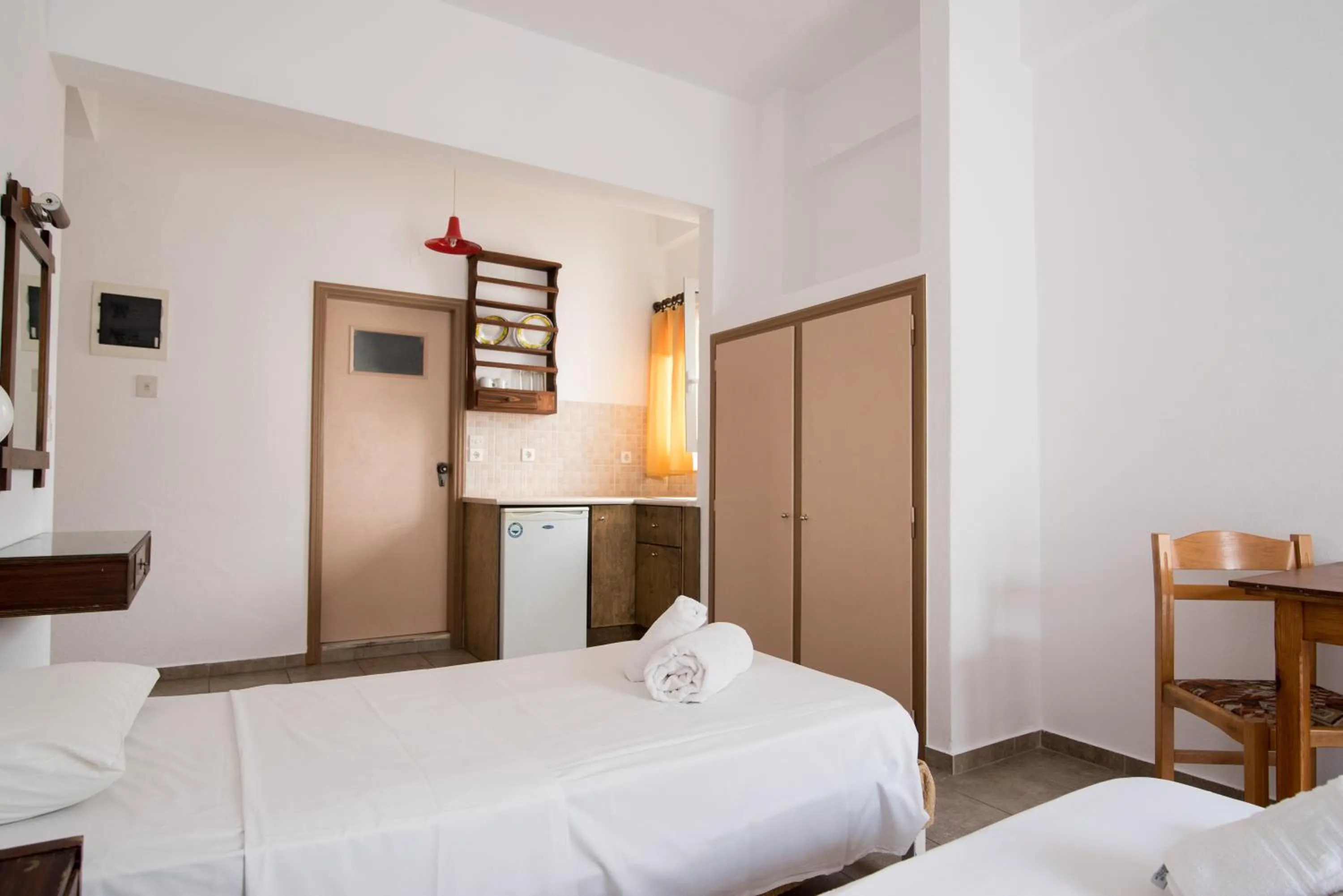 Kitchen or kitchenette, Bed in Ibiscus Hotel Malia