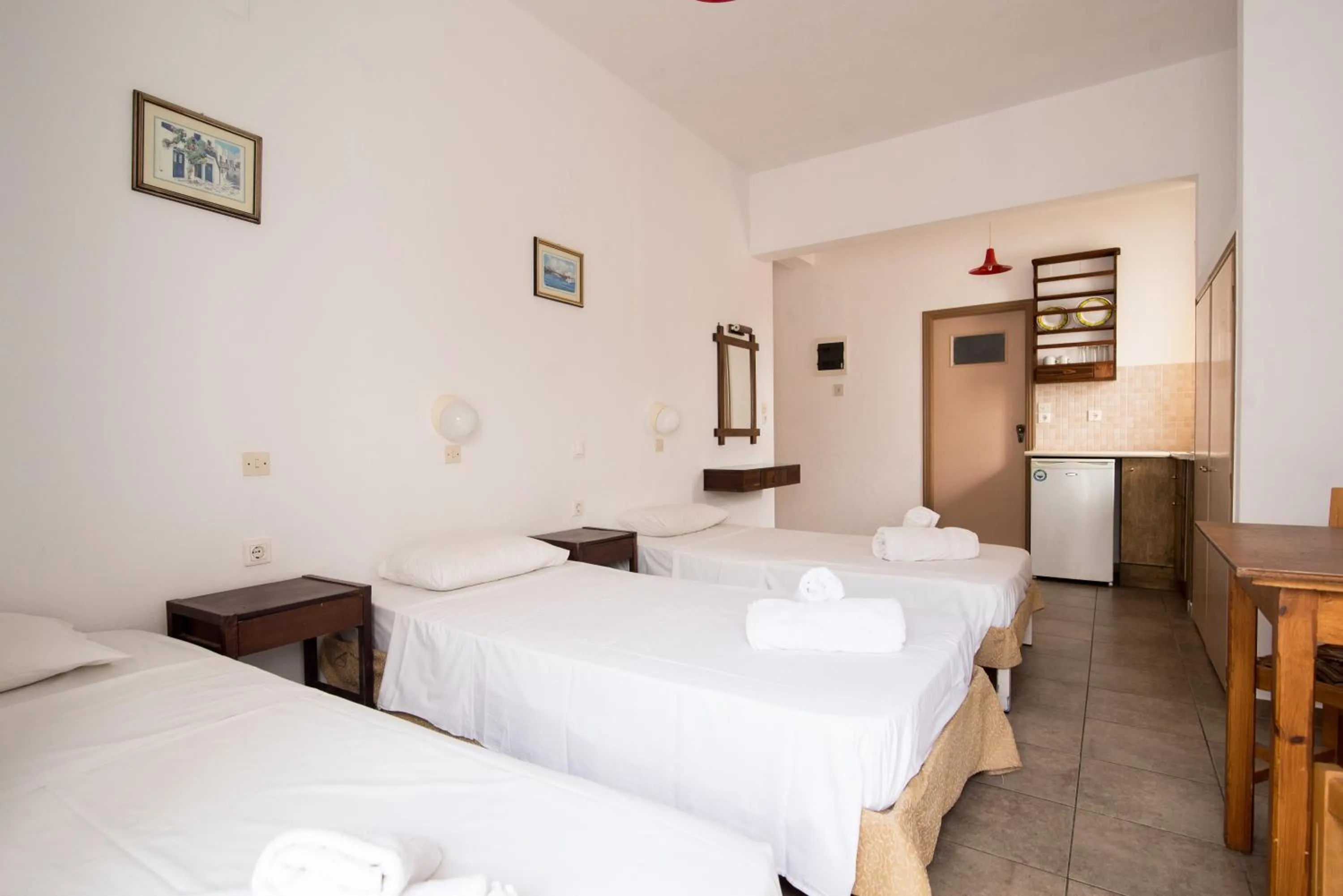 Kitchen or kitchenette, Bed in Ibiscus Hotel Malia