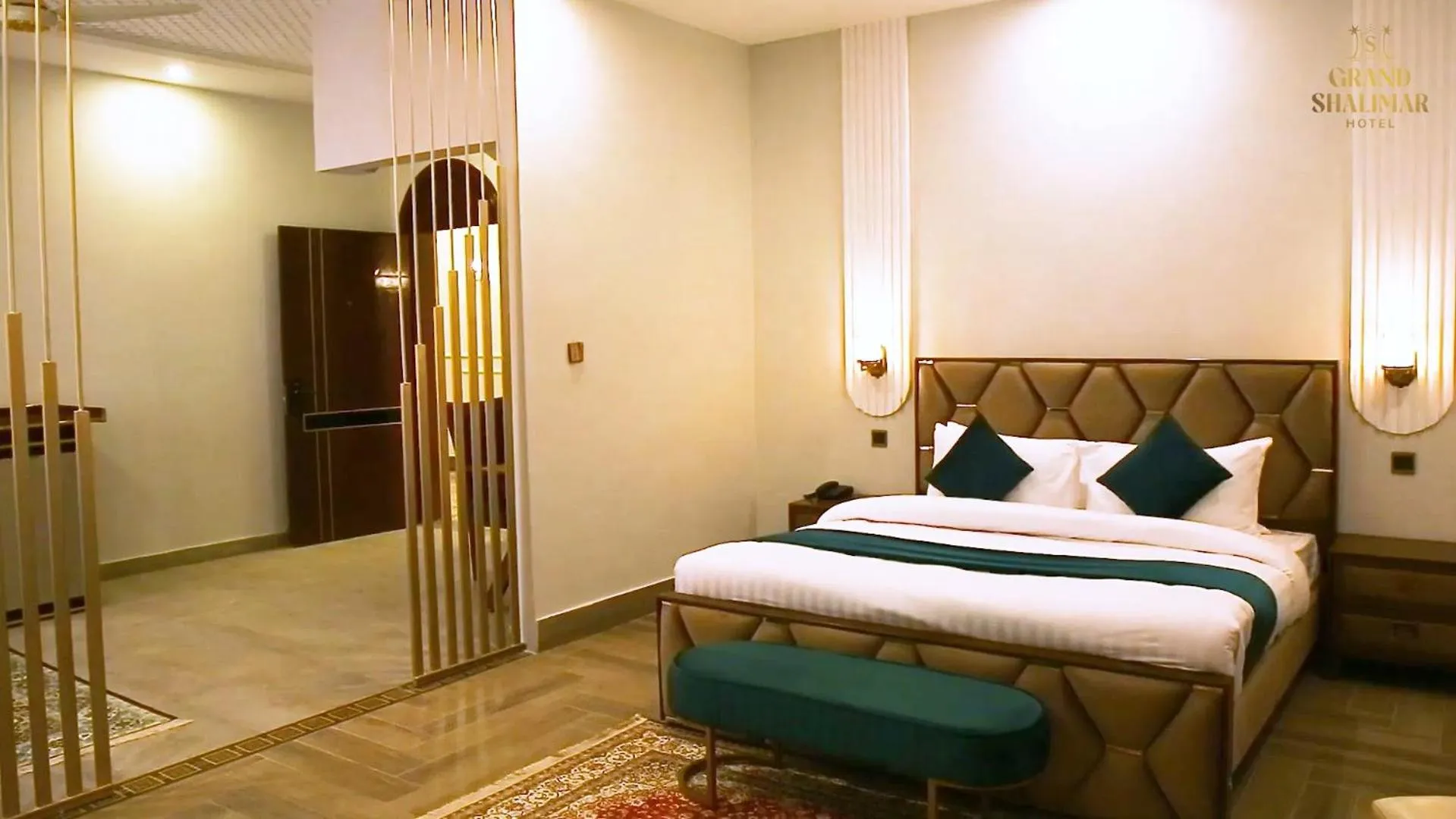 Bed in Grand Shalimar Hotel