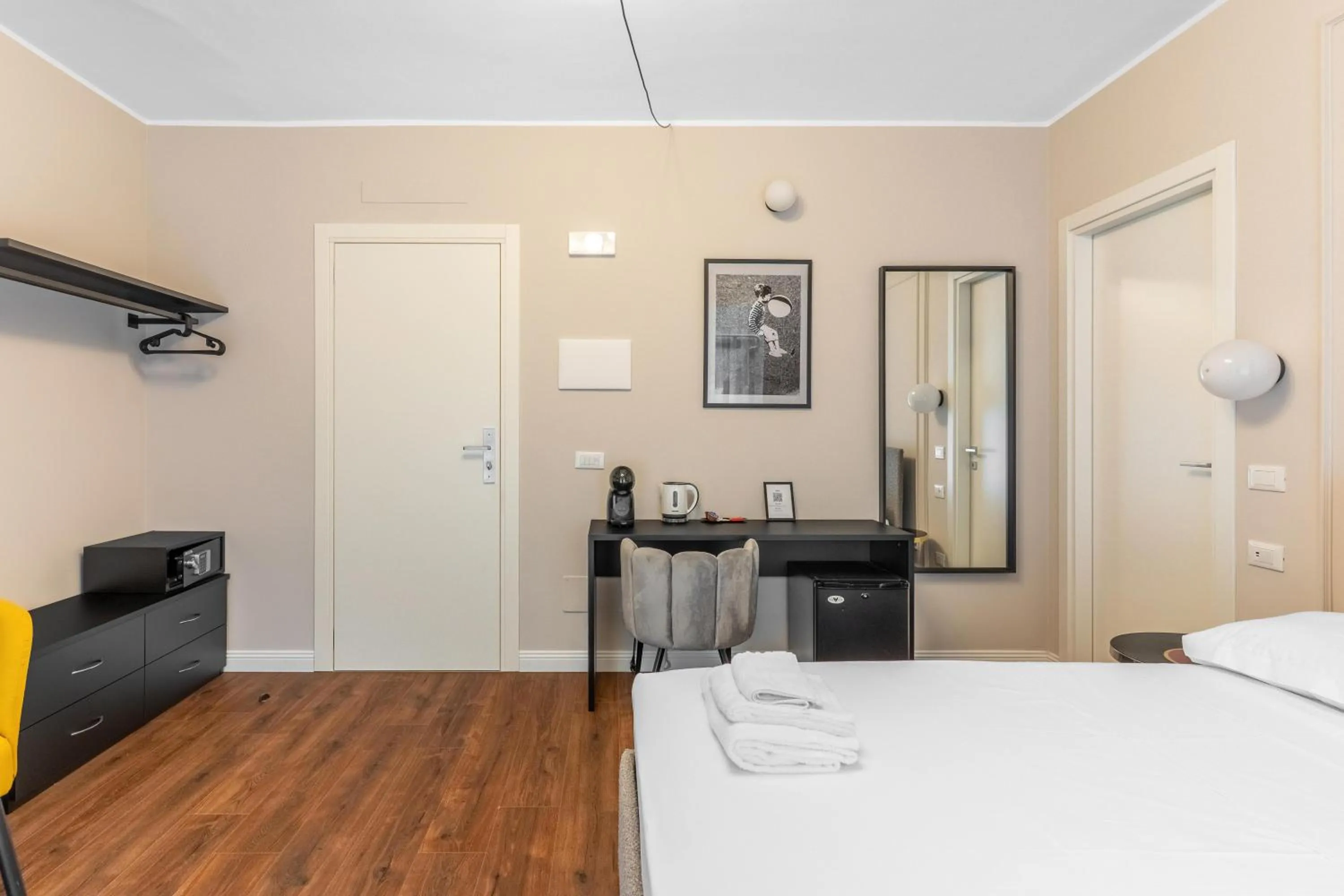 Bed in Torriani Suites Foresteria Lombarda