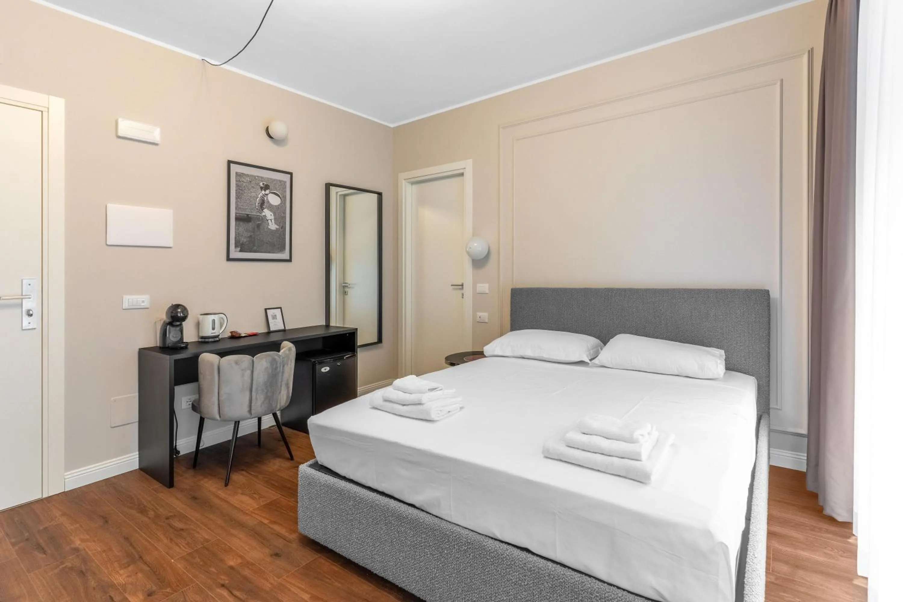 Bed in Torriani Suites Foresteria Lombarda