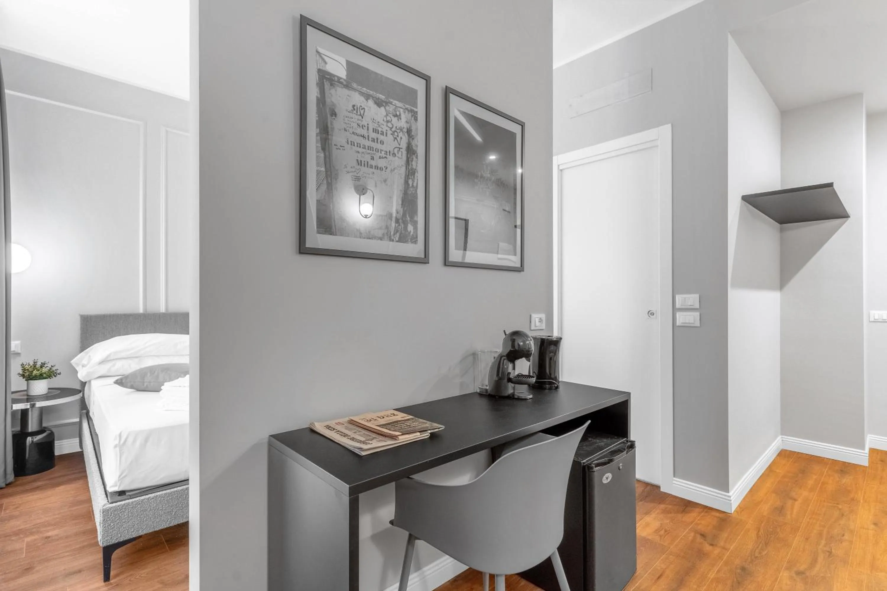 Bed in Torriani Suites Foresteria Lombarda