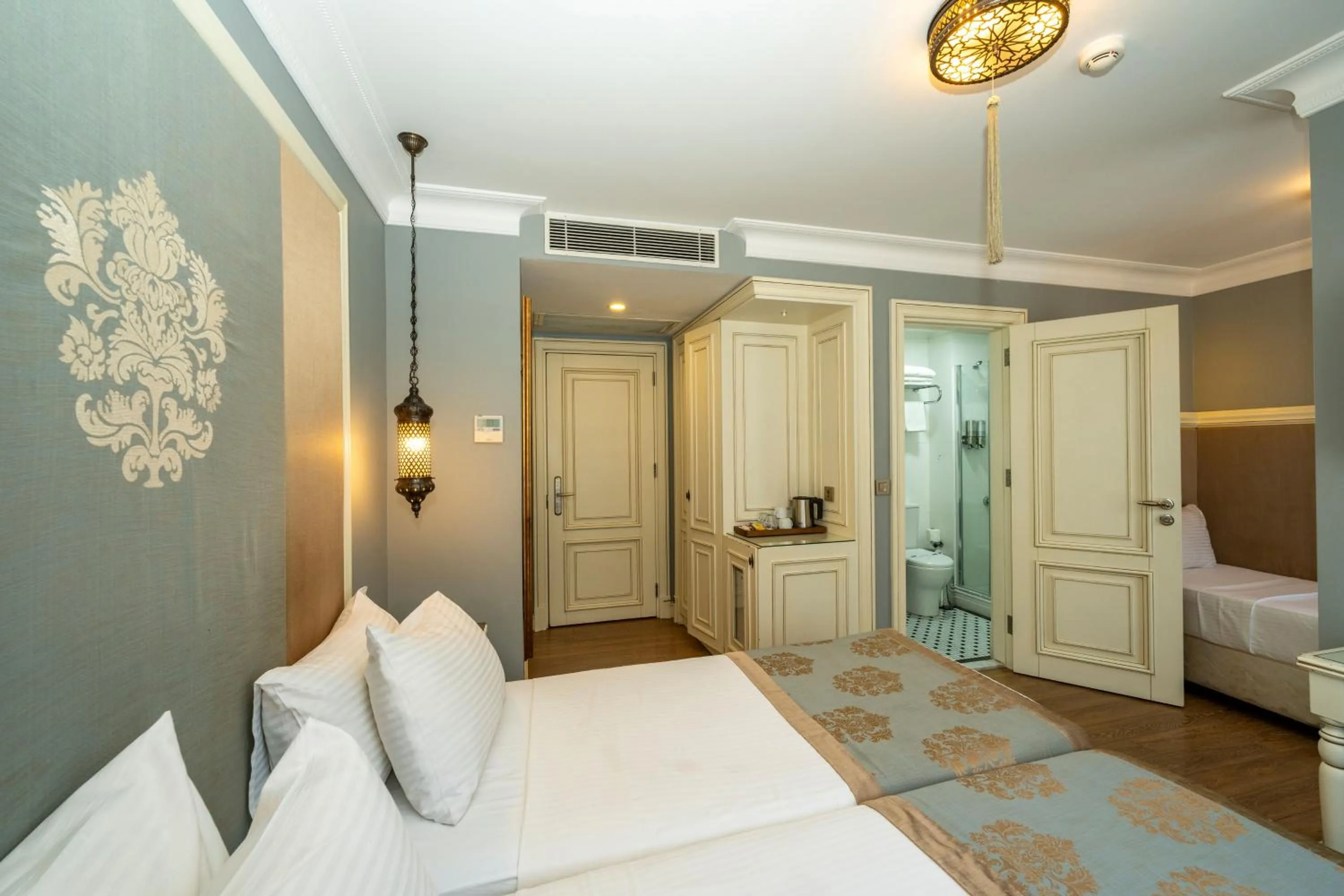 Bed in Raymond Blue Hotel