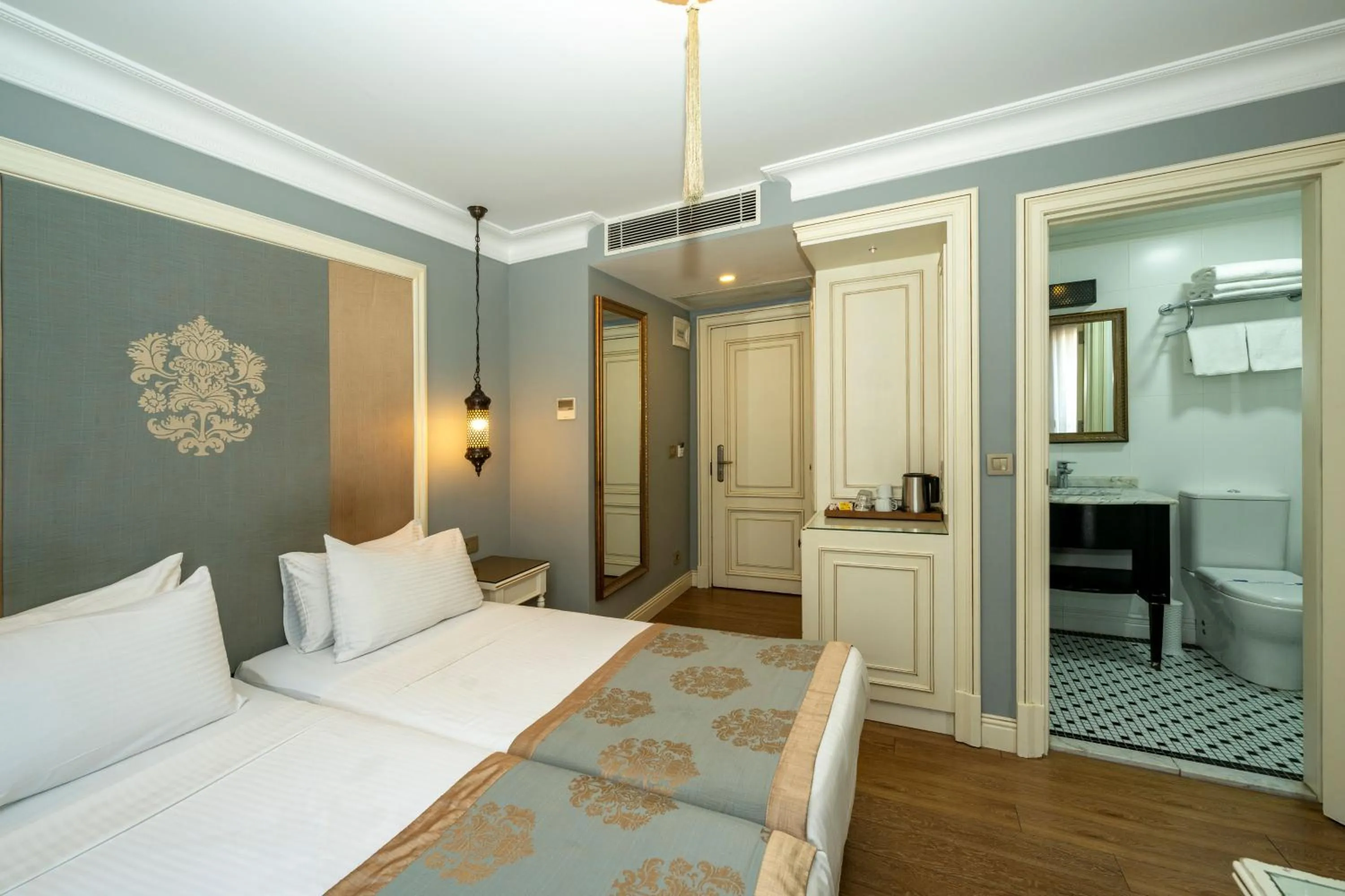 Bedroom in Raymond Blue Hotel