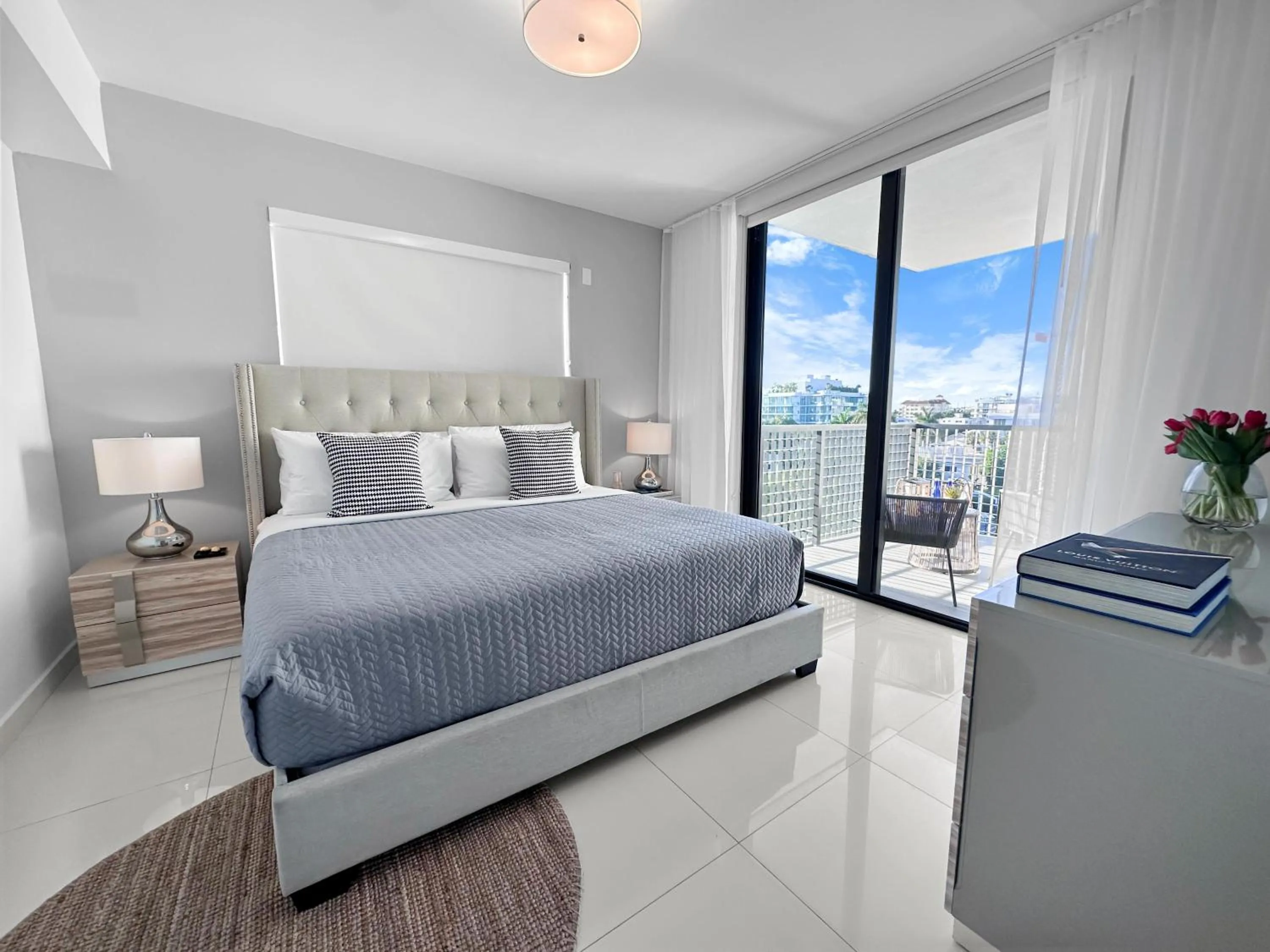 Bed in Bay Breeze Premium Apartments by Eskape Collection
