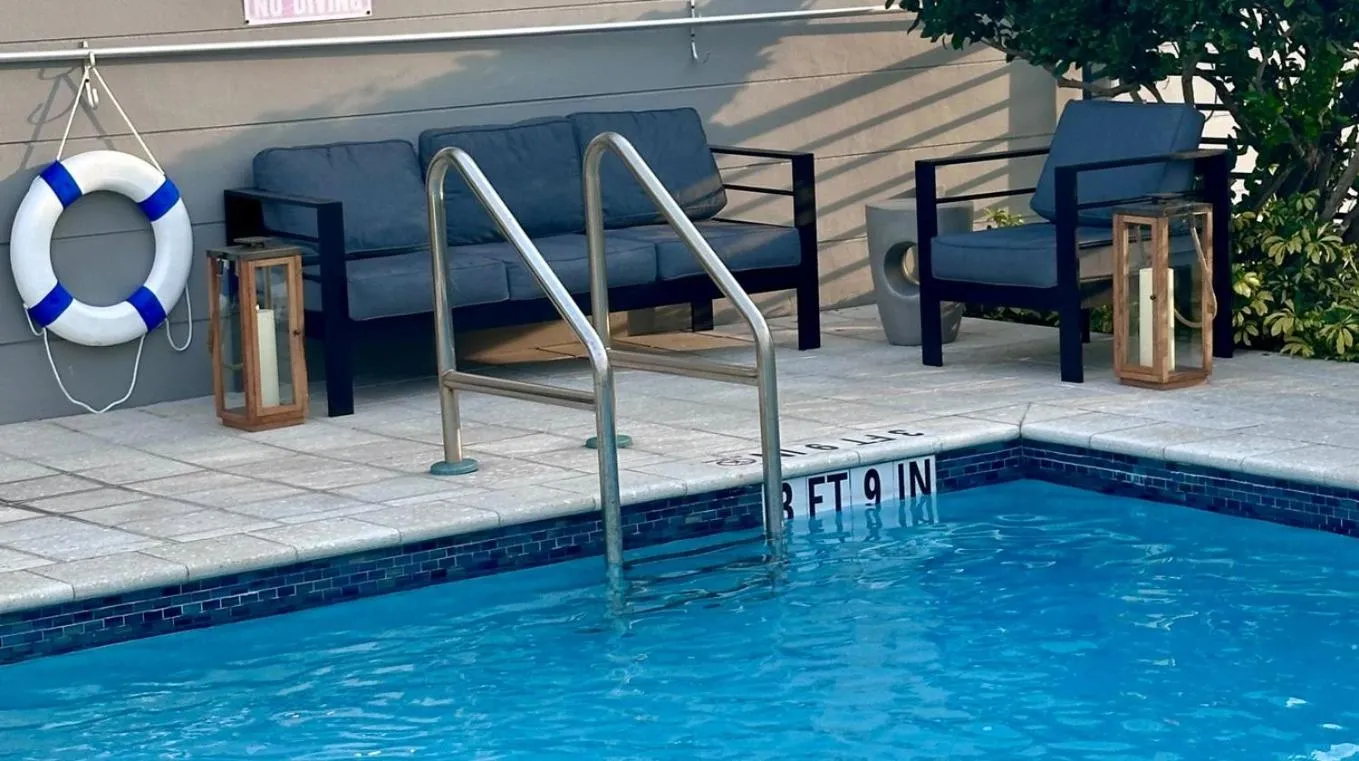 Swimming pool in Bay Breeze Premium Apartments by Eskape Collection